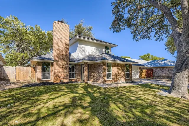 a front view of a house with swimming pool