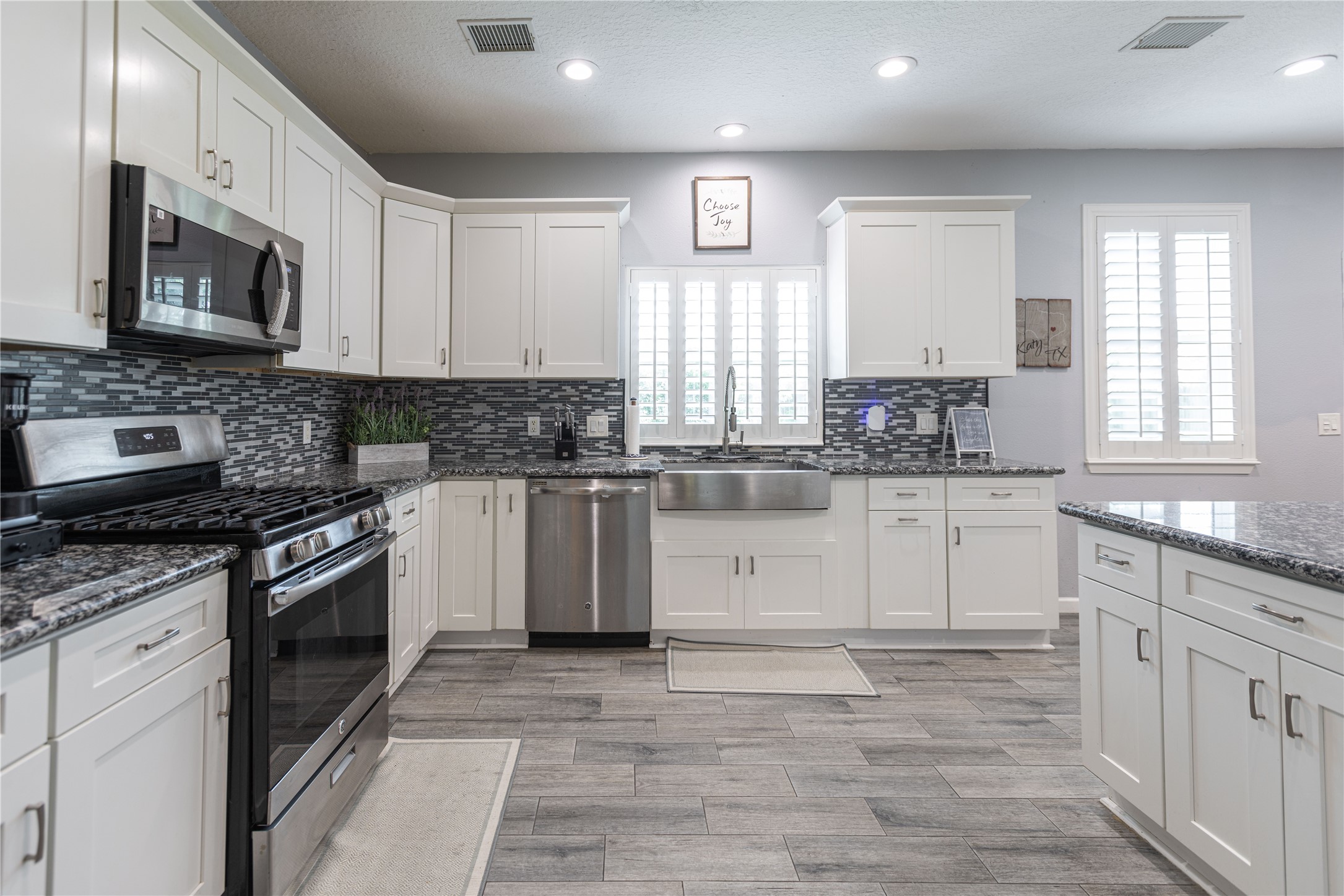 5922 Walkabout Way Katy, TX 77450 - Photo 11 of 38 Enjoy a spacious kitchen featuring ample cabinet space