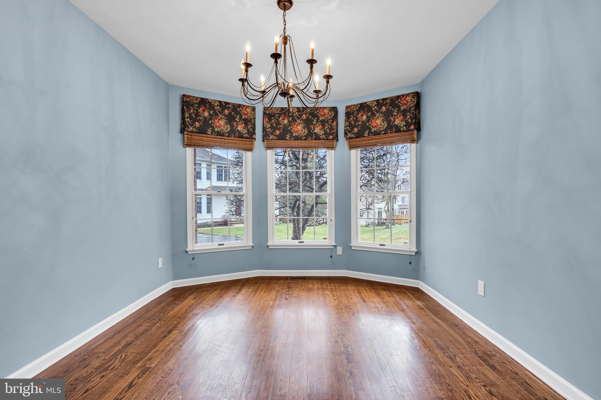 21 Wilkinson Way Princeton, NJ 08540 - Photo 12 of 43 wooden floor in an empty room with a window
