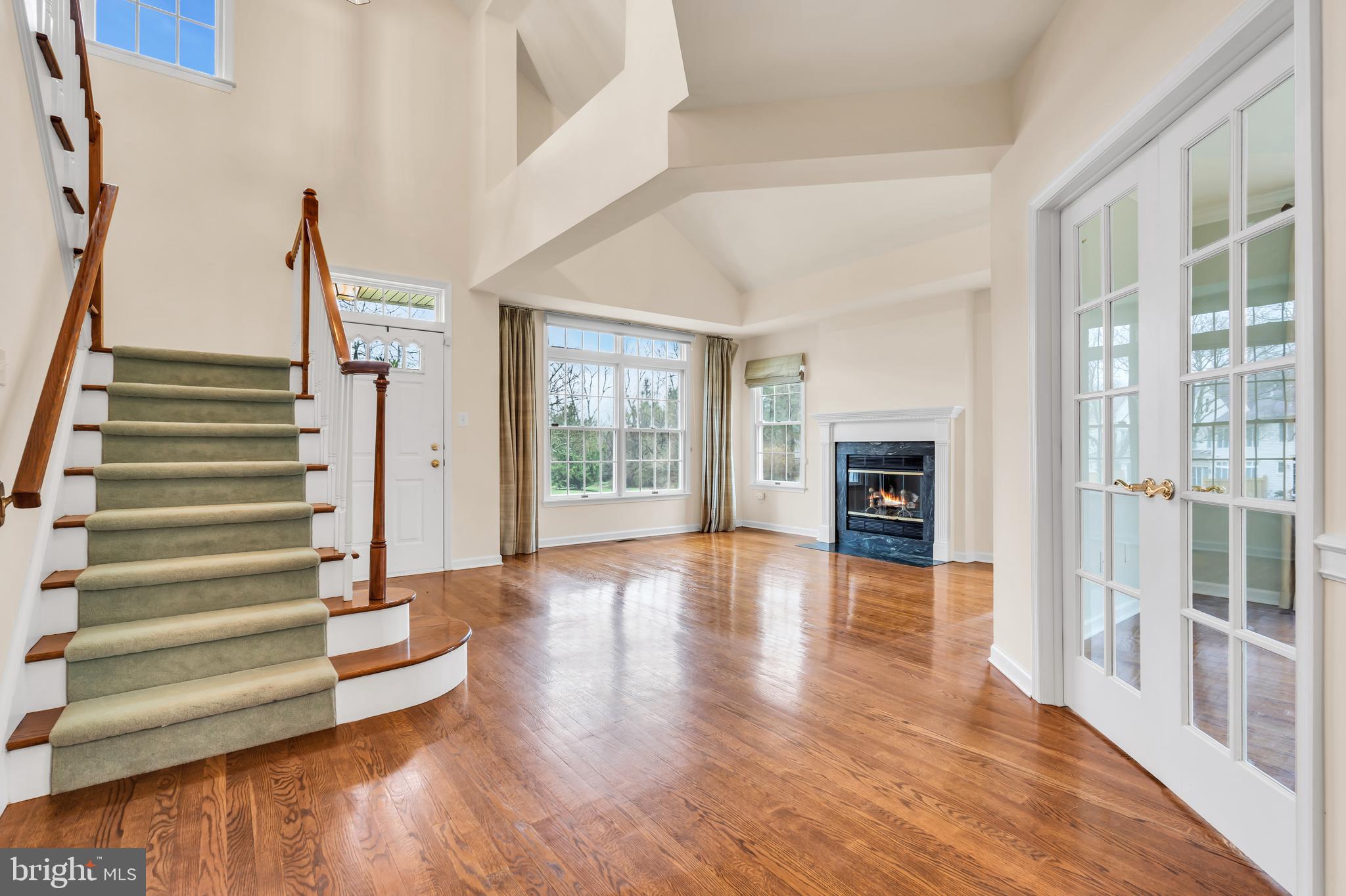 21 Wilkinson Way Princeton, NJ 08540 - Photo 16 of 43 a view of entryway with wooden floor and windows