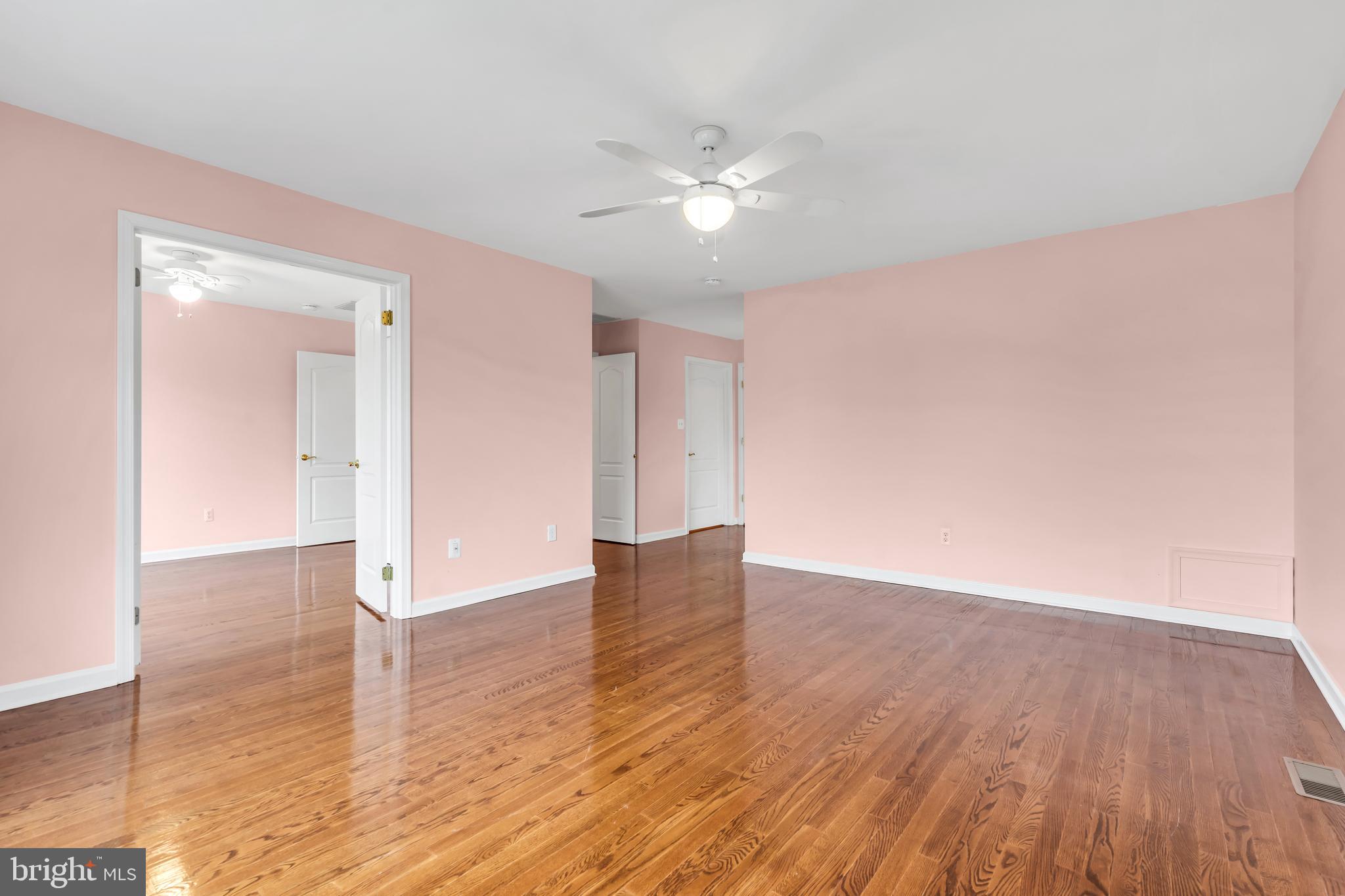 21 Wilkinson Way Princeton, NJ 08540 - Photo 26 of 43 a view of an empty room with wooden floor