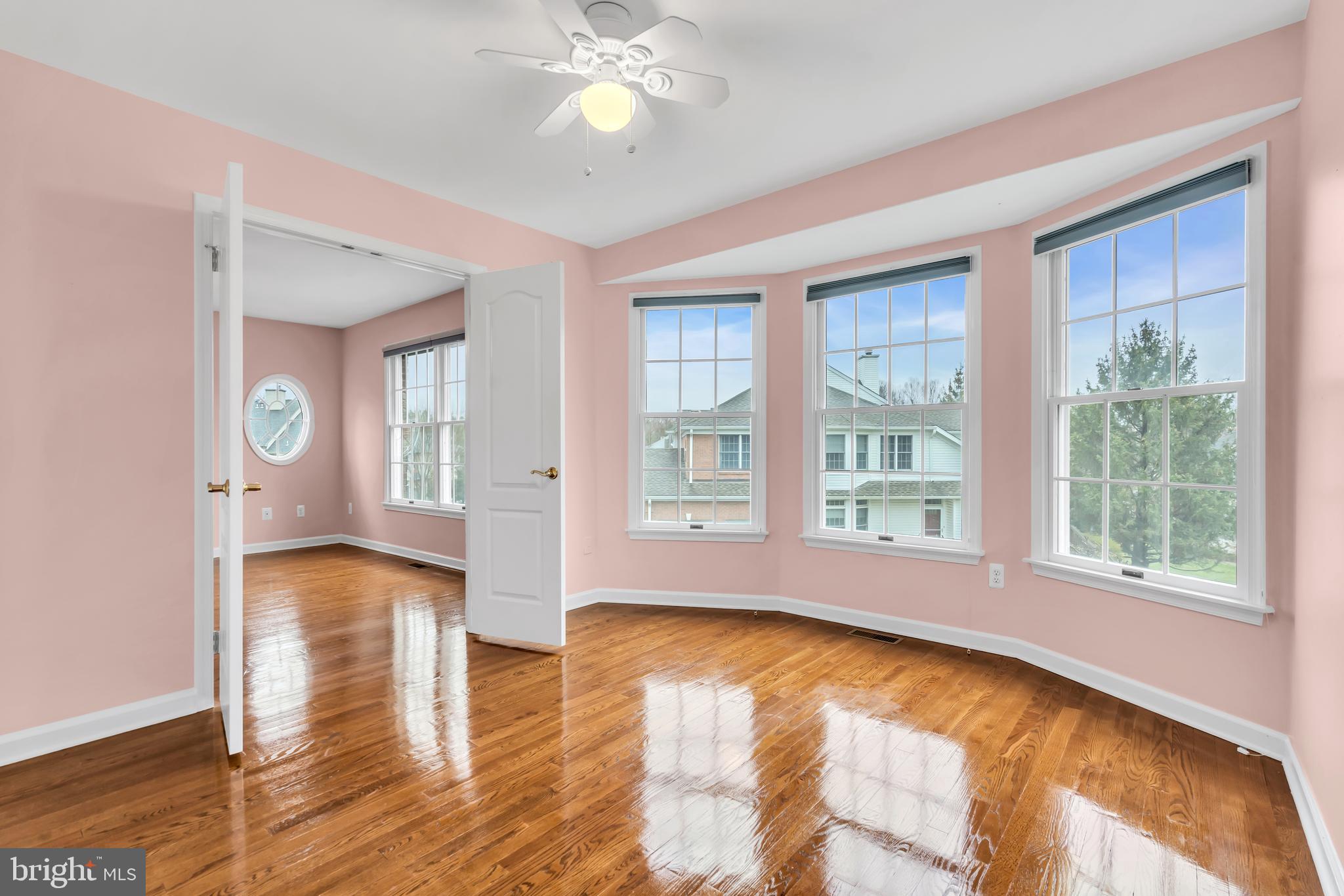21 Wilkinson Way Princeton, NJ 08540 - Photo 30 of 43 a view of empty room with wooden floor and fan