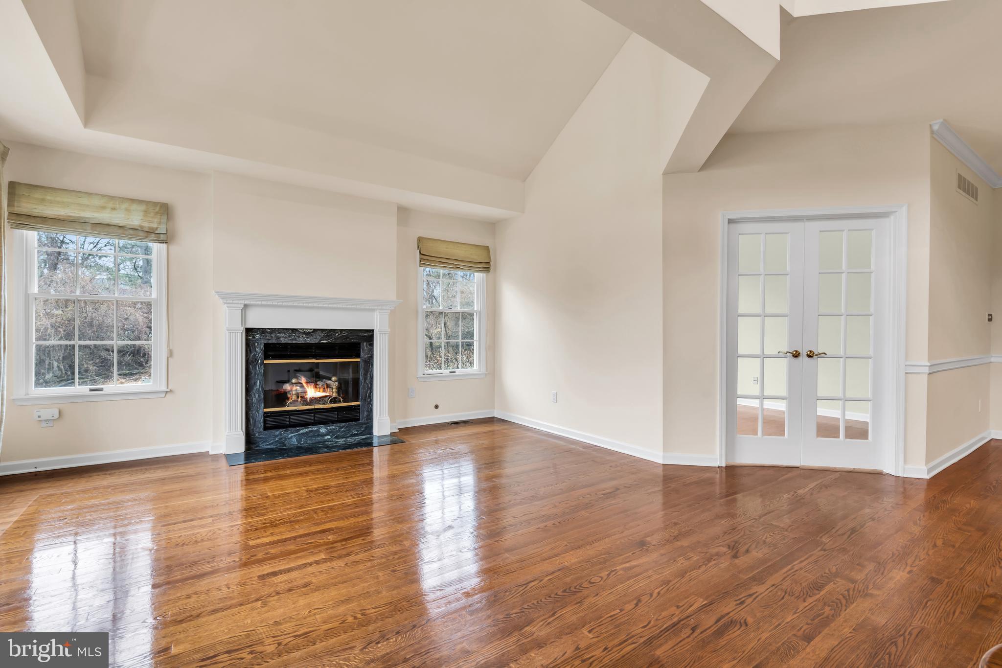 21 Wilkinson Way Princeton, NJ 08540 - Photo 5 of 43 an empty room with windows and fireplace