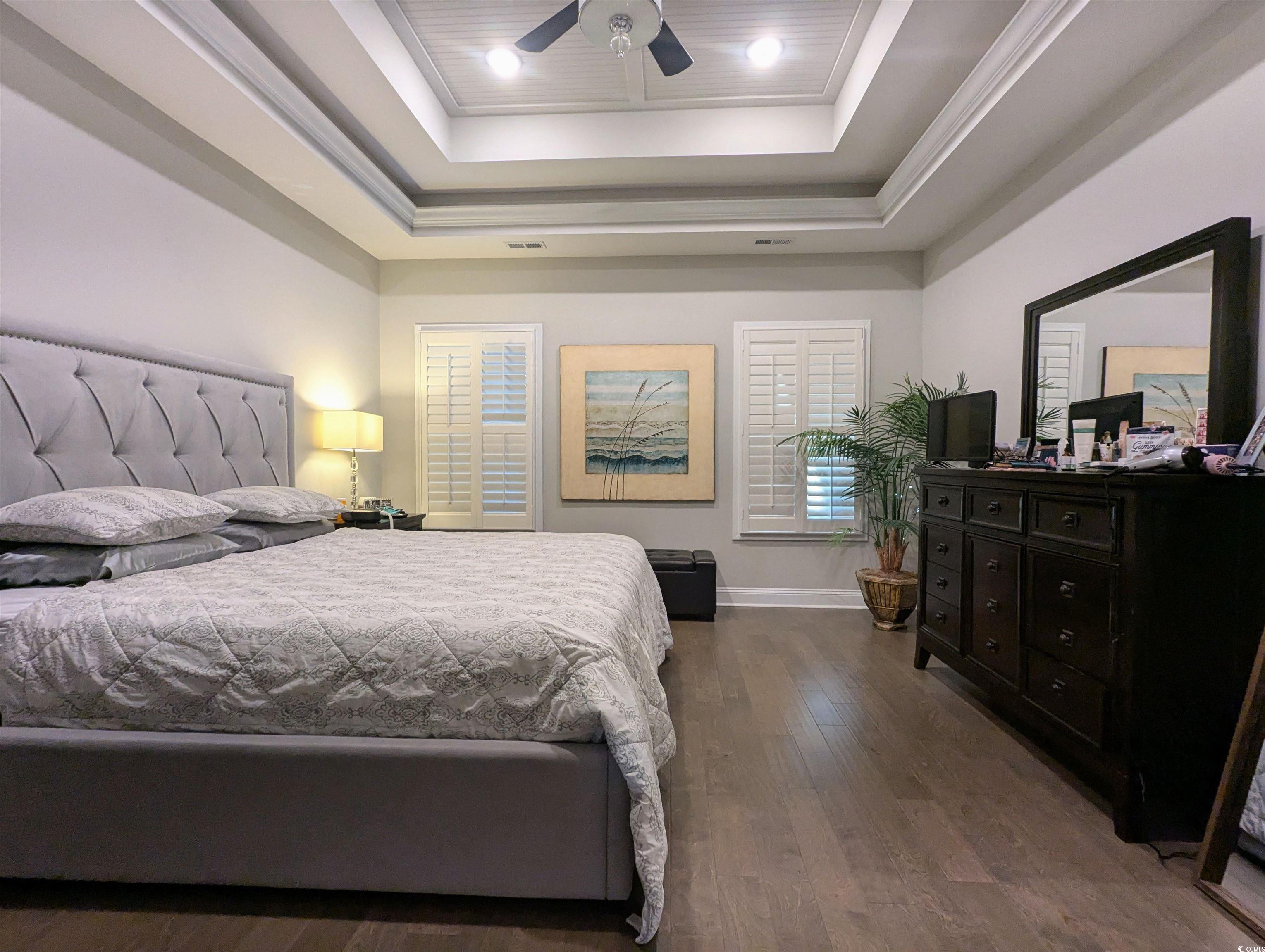 18 Trigger Fish Lane Murrells Inlet, SC 29576 - Photo 17 of 31 Bedroom featuring crown molding, a raised ceiling,