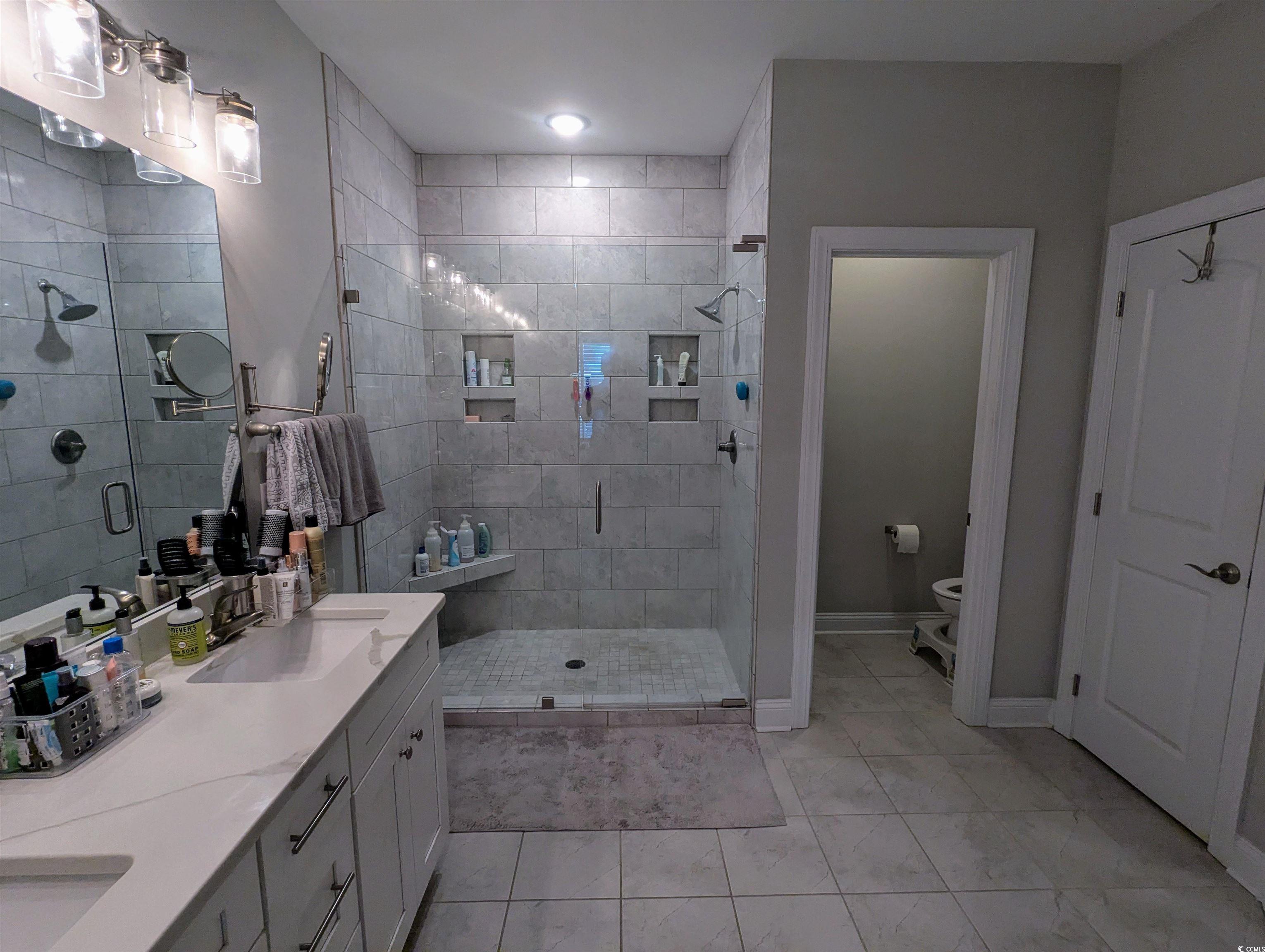 18 Trigger Fish Lane Murrells Inlet, SC 29576 - Photo 18 of 31 Full bathroom featuring tile patterned flooring, a