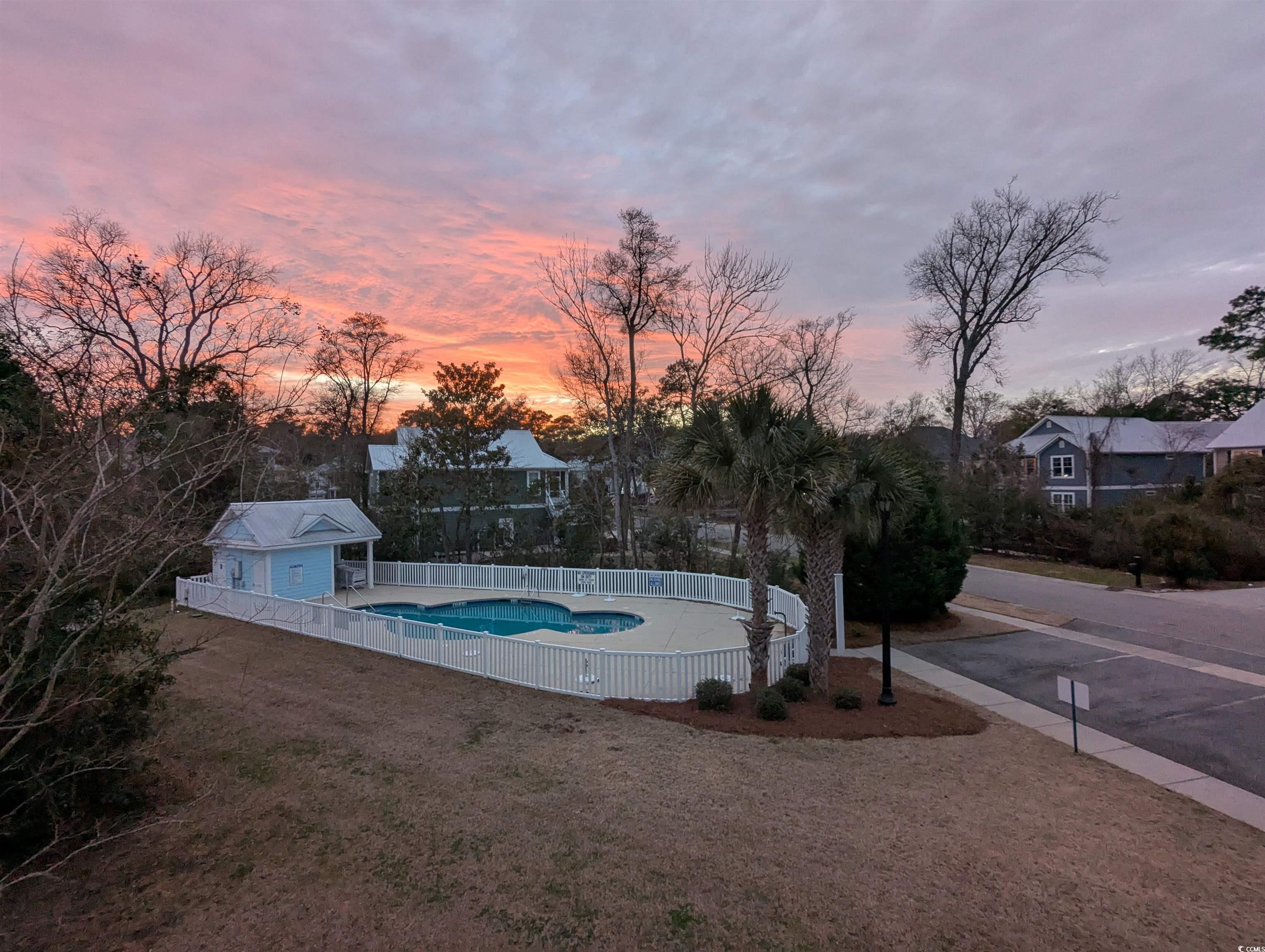 18 Trigger Fish Lane Murrells Inlet, SC 29576 - Photo 25 of 31 View of swimming pool featuring fence and a fenced