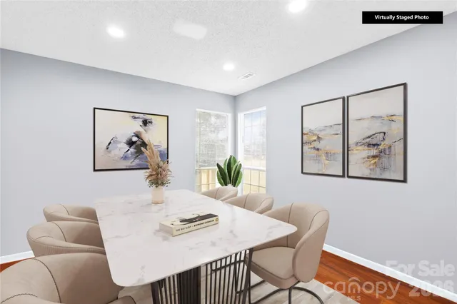 a view of a dining room with furniture