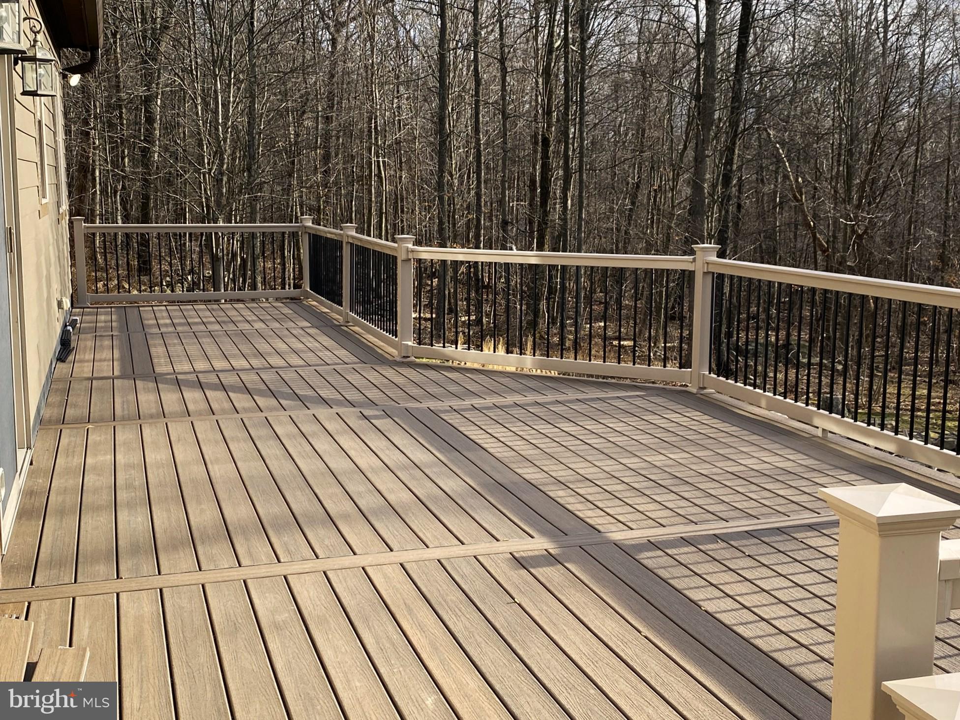 10915 Rachael Avenue Midlothian, MD 21543 - Photo 38 of 52 a view of balcony with wooden floor