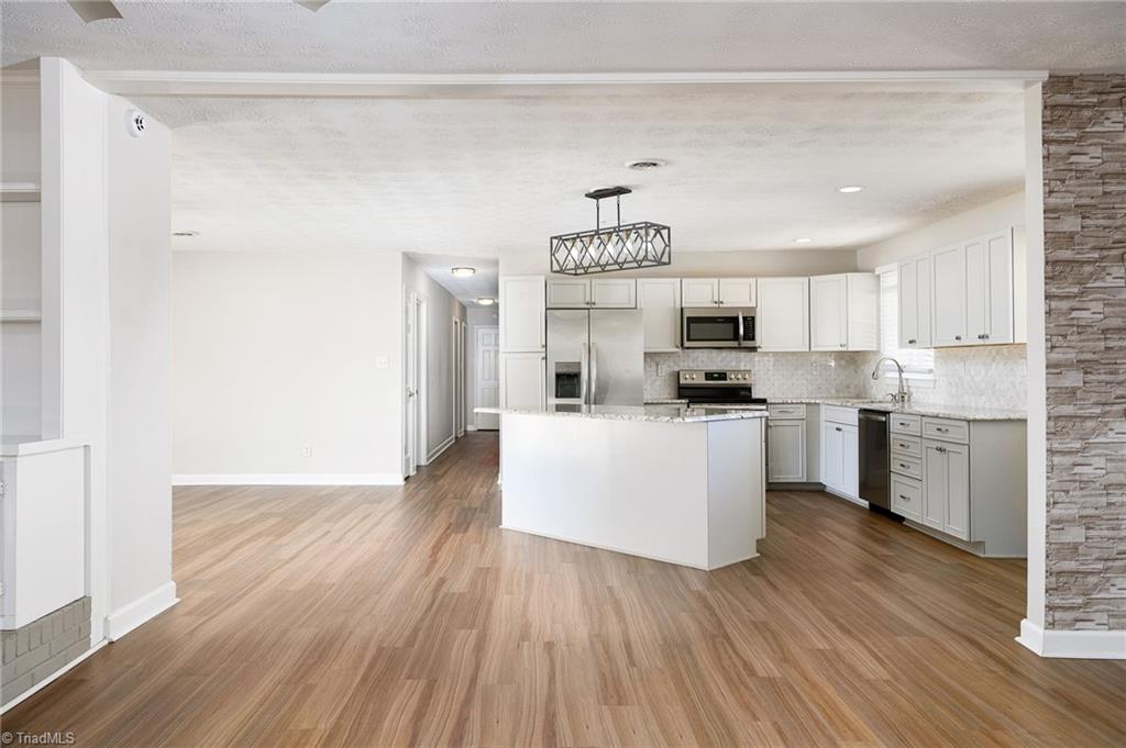 3025 Hickory Tree Road Winston-Salem, NC 27127 - Photo 21 of 33 Looking from the Huge Den/ Dining into kitchen.