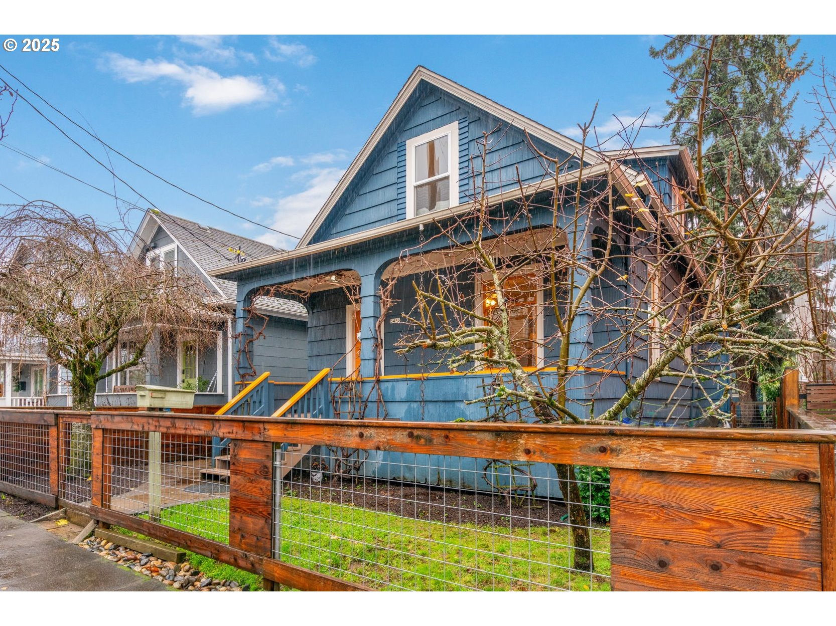 5415 Northeast 14th Place Portland, OR 97211 - Photo 1 of 38 a front view of house with a yard