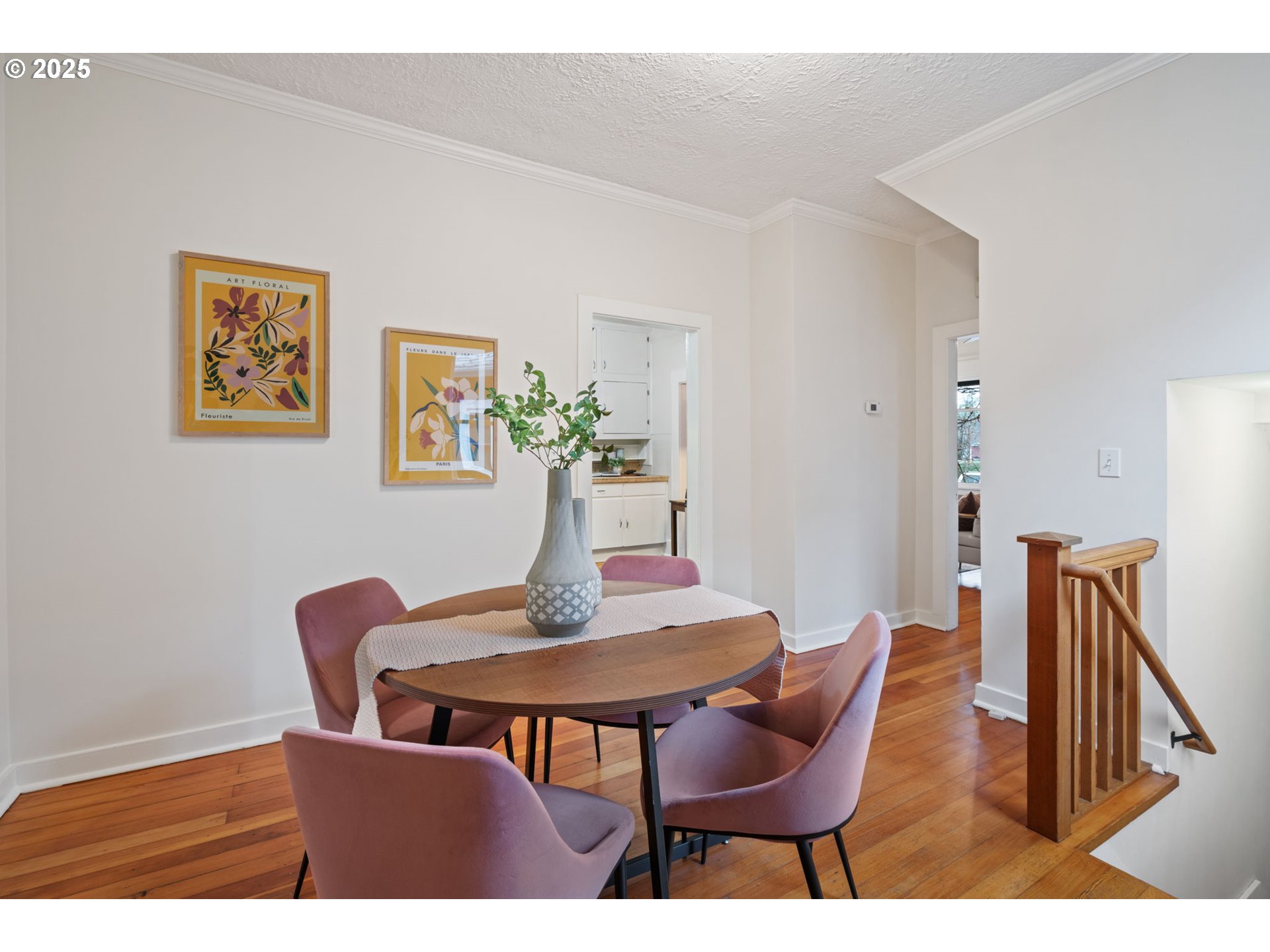 5415 Northeast 14th Place Portland, OR 97211 - Photo 17 of 38 a view of a dining room with furniture and wooden floor