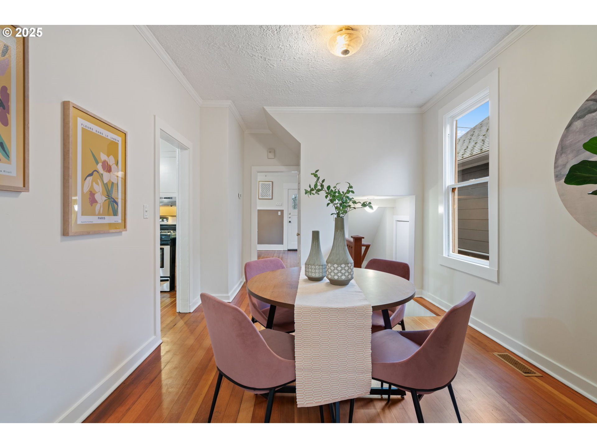 5415 Northeast 14th Place Portland, OR 97211 - Photo 18 of 38 a dining room with furniture and wooden floor