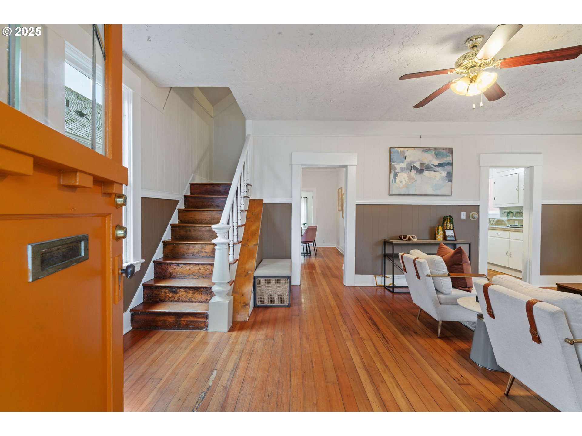 5415 Northeast 14th Place Portland, OR 97211 - Photo 2 of 38 a living room with furniture and a wooden floor