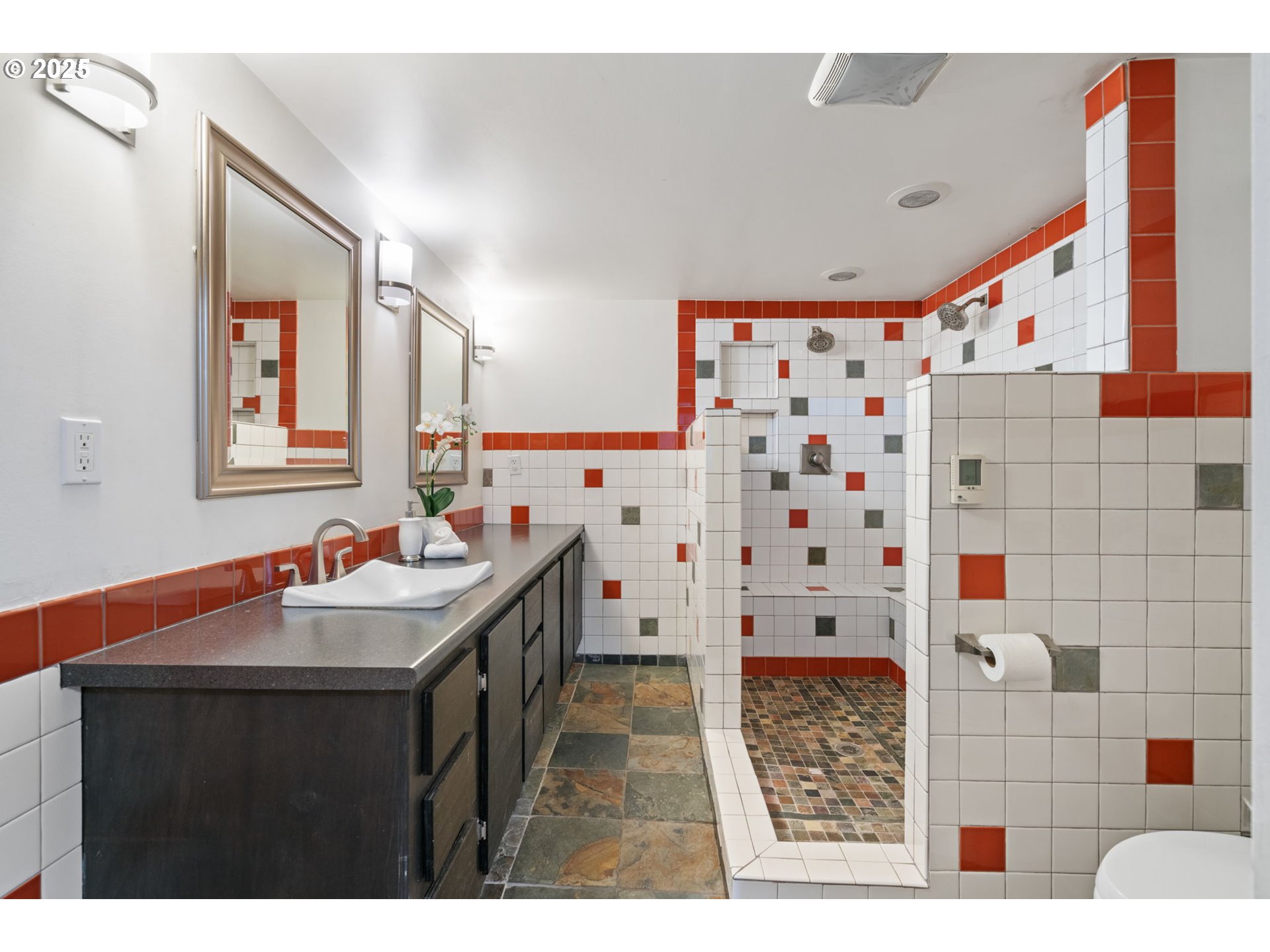 5415 Northeast 14th Place Portland, OR 97211 - Photo 33 of 38 a bathroom with a sink a toilet a shower and a mirror