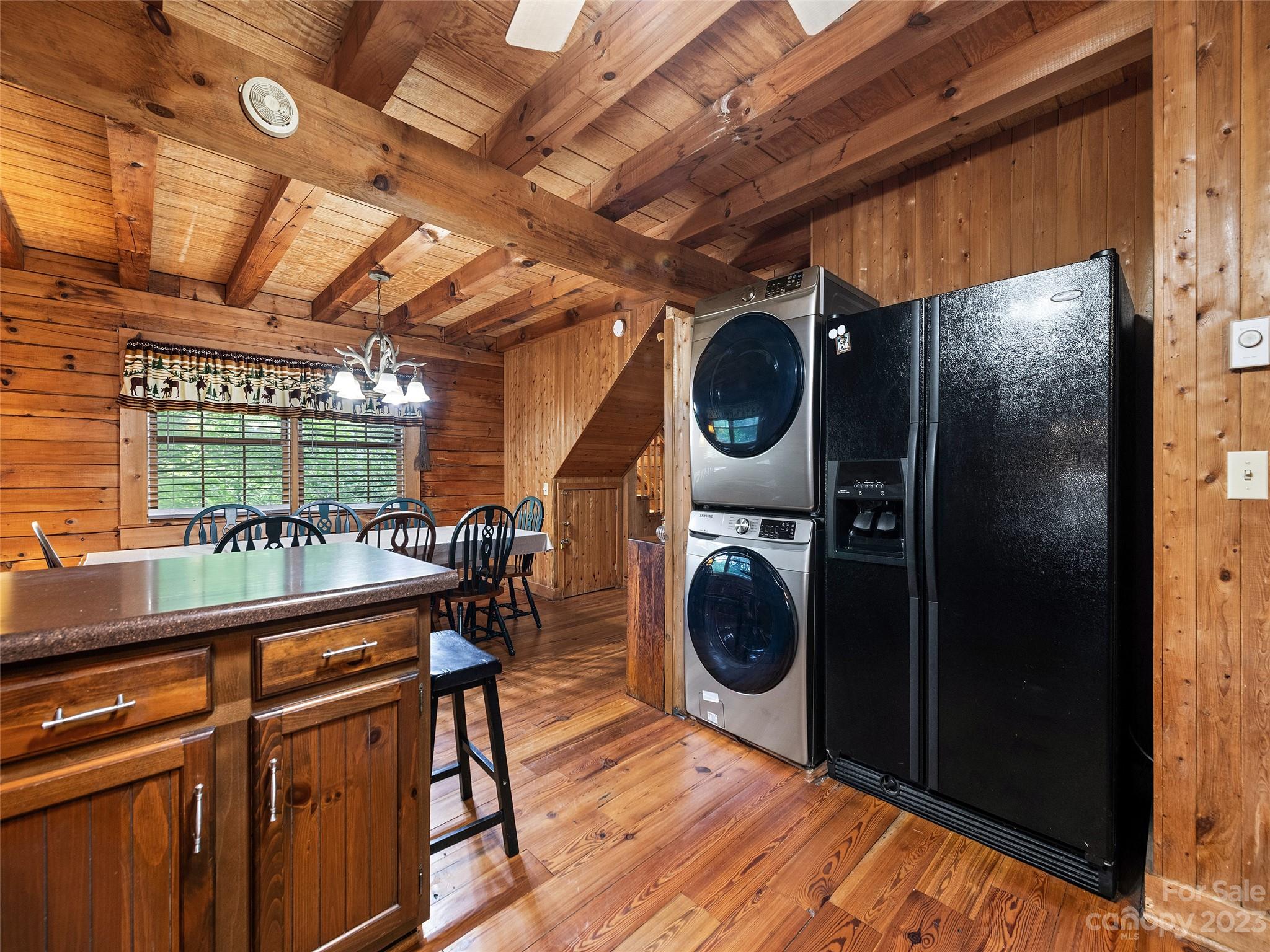 81 Railroad Grade Road Maggie Valley, NC 28751 - Photo 14 of 38 a utility room with dryer and washer