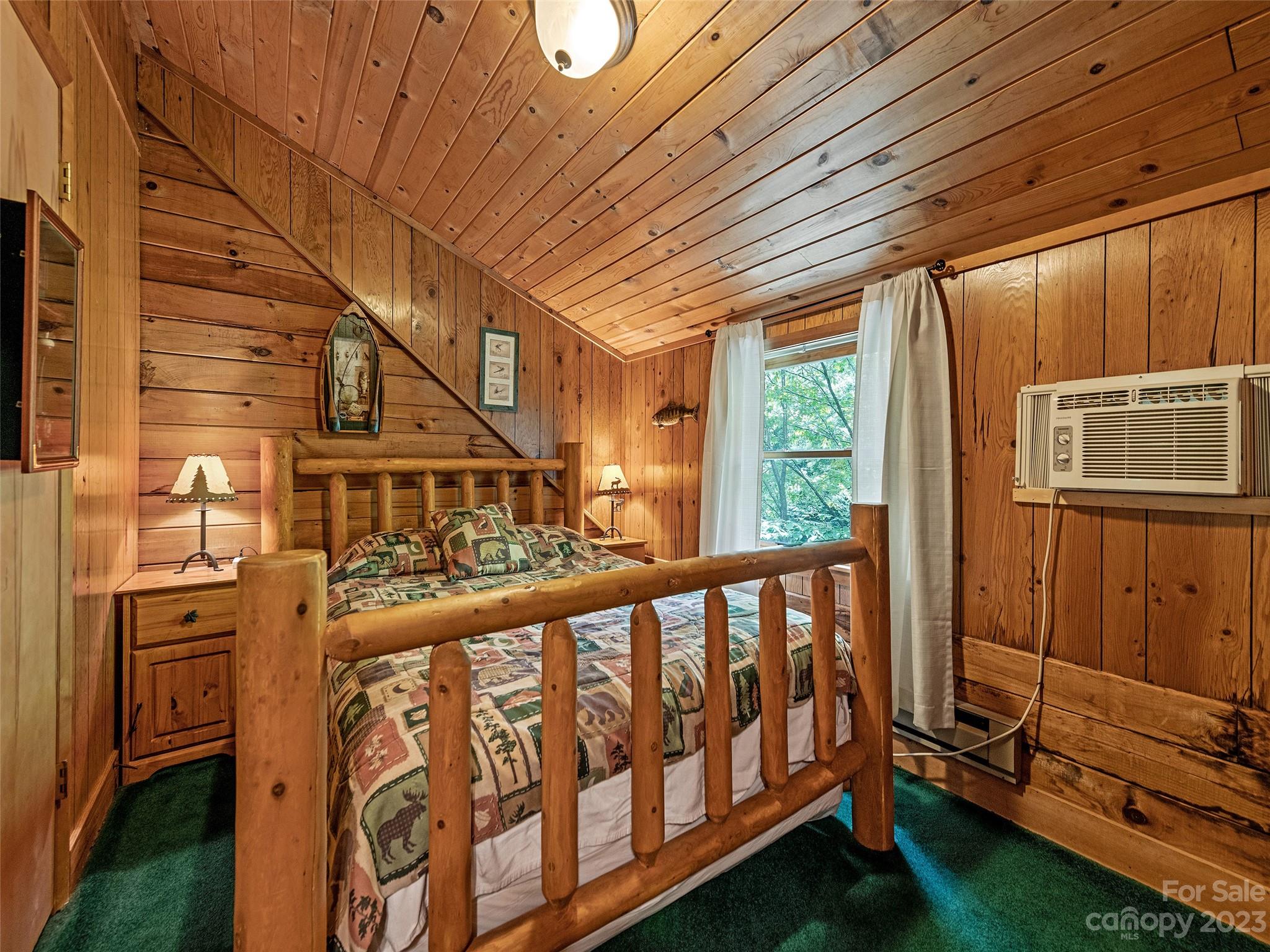 81 Railroad Grade Road Maggie Valley, NC 28751 - Photo 26 of 38 a view of a porch with furniture