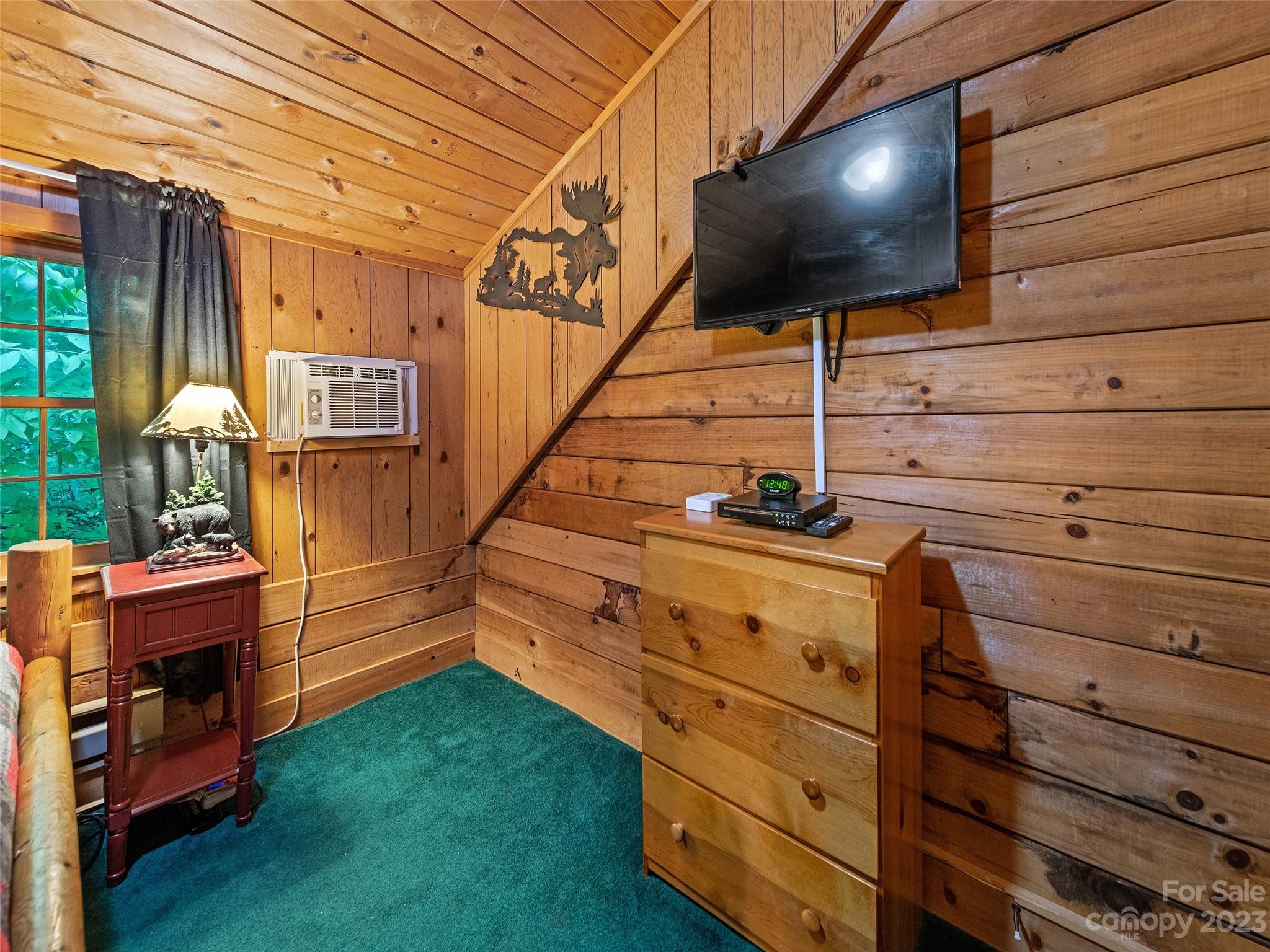 81 Railroad Grade Road Maggie Valley, NC 28751 - Photo 28 of 38 a view of an entryway with wooden floor