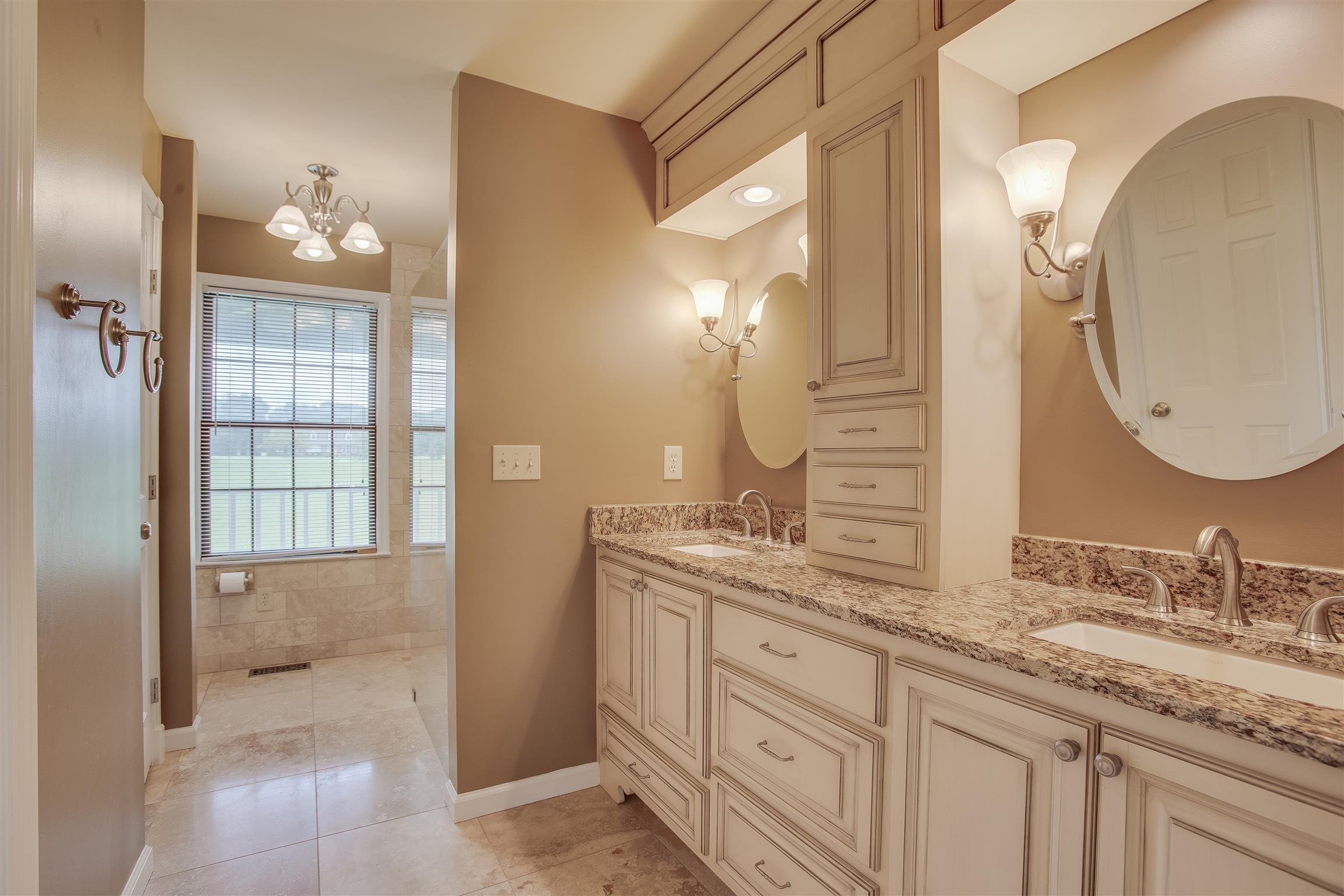 1157 Roseland Road Columbia, TN 38401 - Photo 15 of 30 a bathroom with a double vanity sink and a mirror