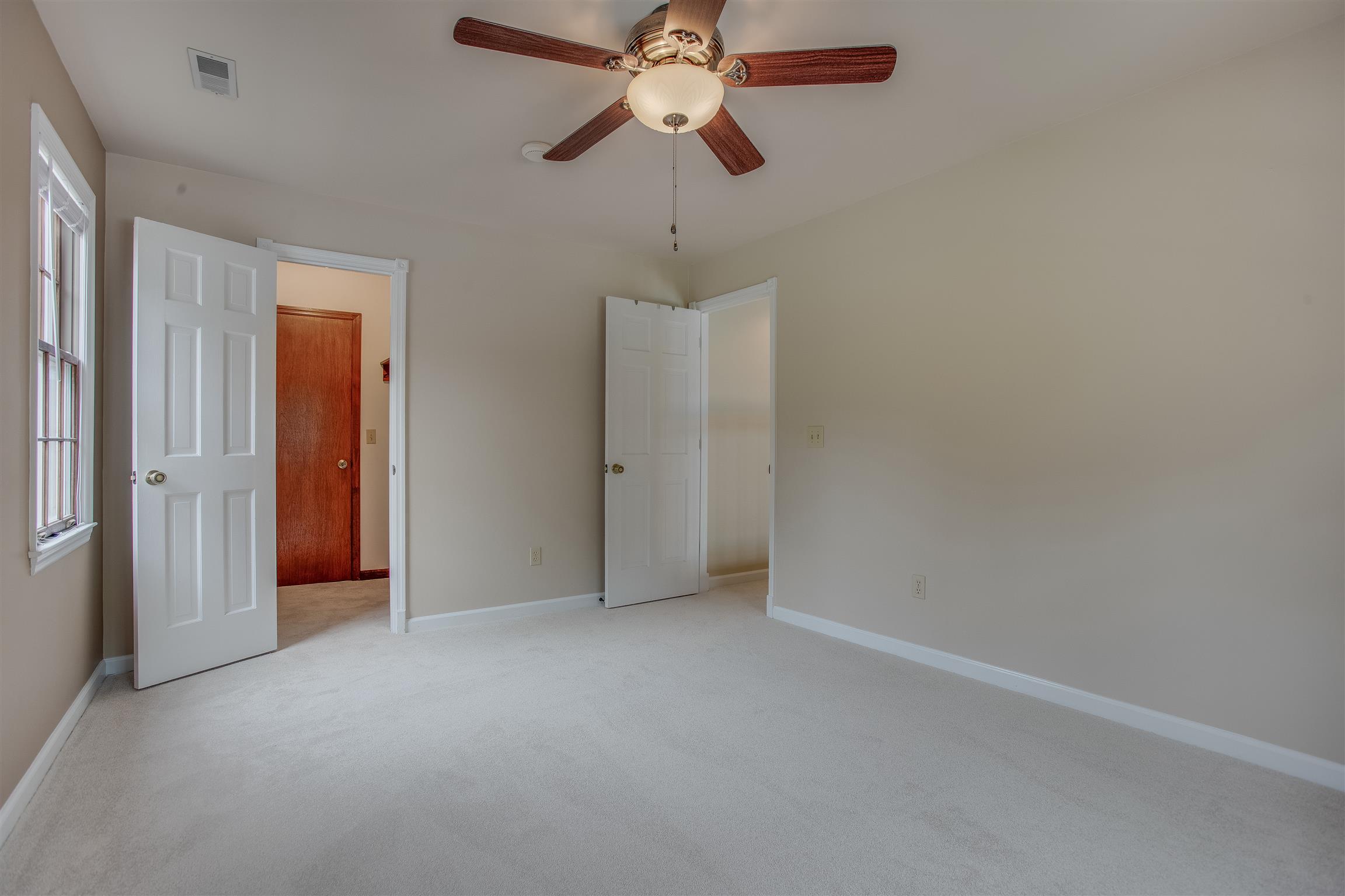 1157 Roseland Road Columbia, TN 38401 - Photo 21 of 30 a view of empty room with chandelier fan
