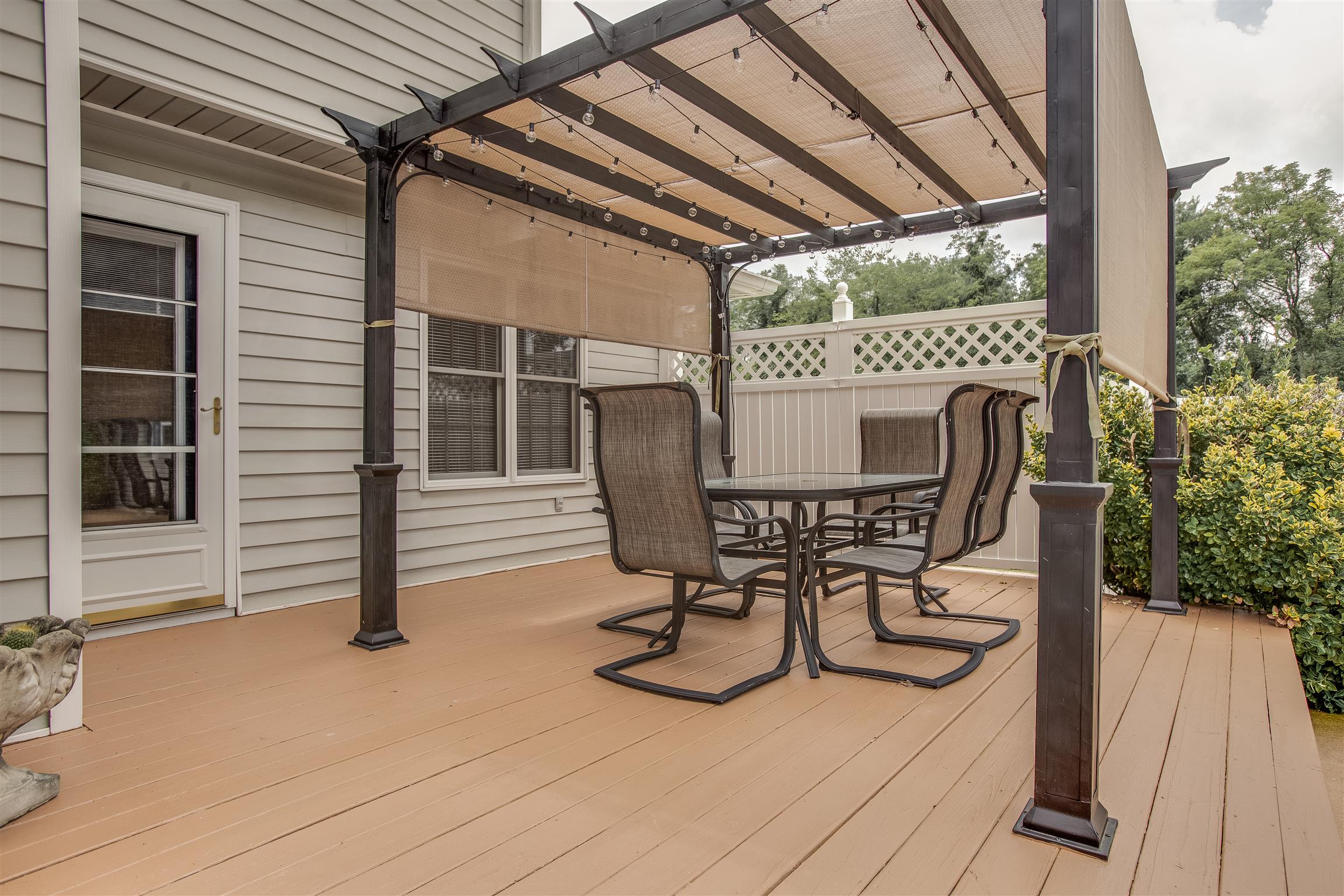 1157 Roseland Road Columbia, TN 38401 - Photo 23 of 30 a view of a chairs and table in backyard