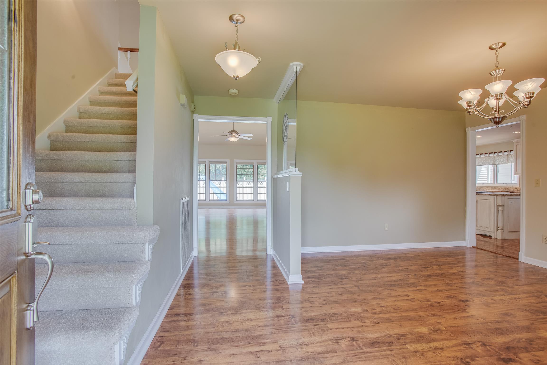 1157 Roseland Road Columbia, TN 38401 - Photo 7 of 30 a view of a room with wooden floor and staircase