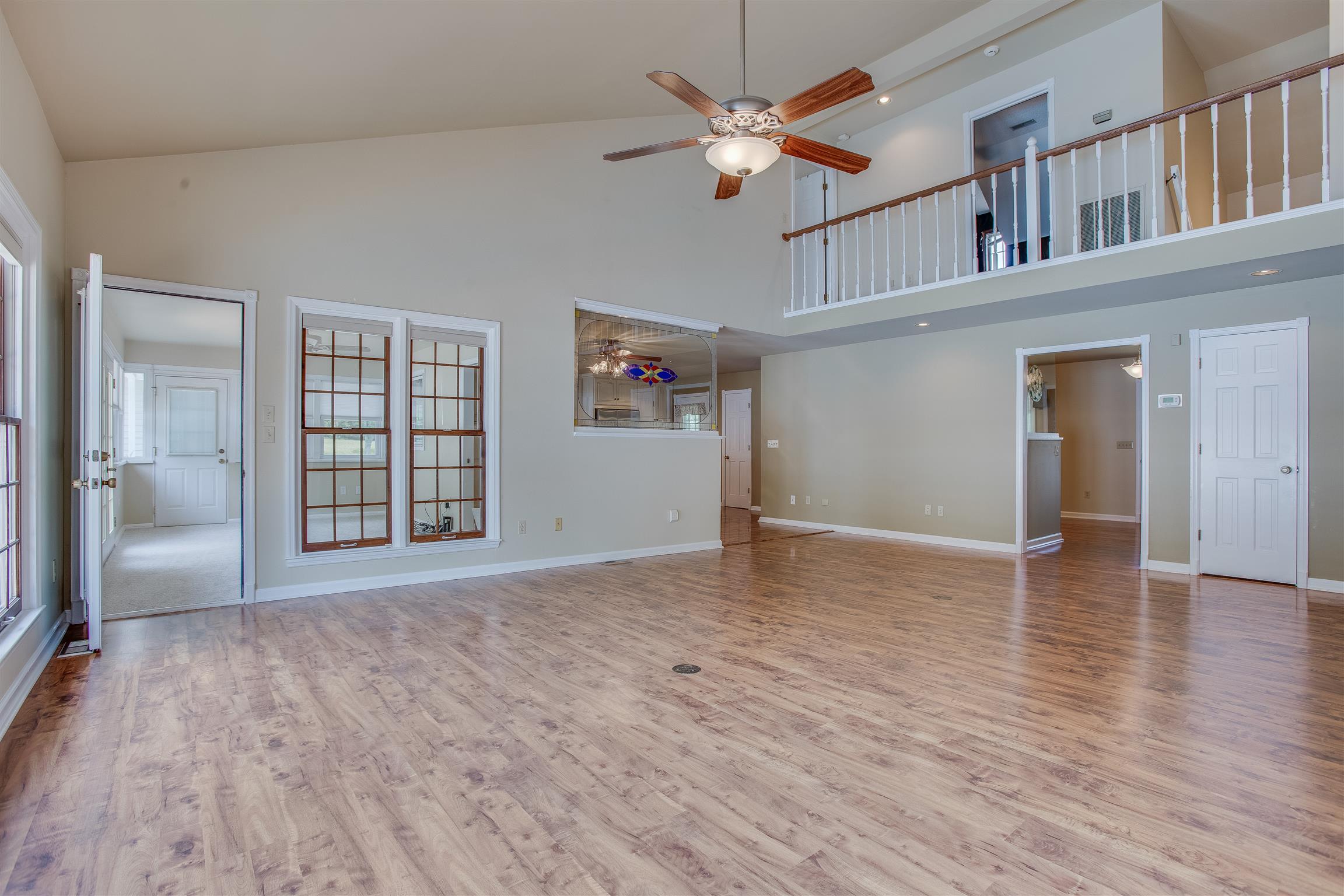 1157 Roseland Road Columbia, TN 38401 - Photo 10 of 30 wooden floor in an empty room with a window