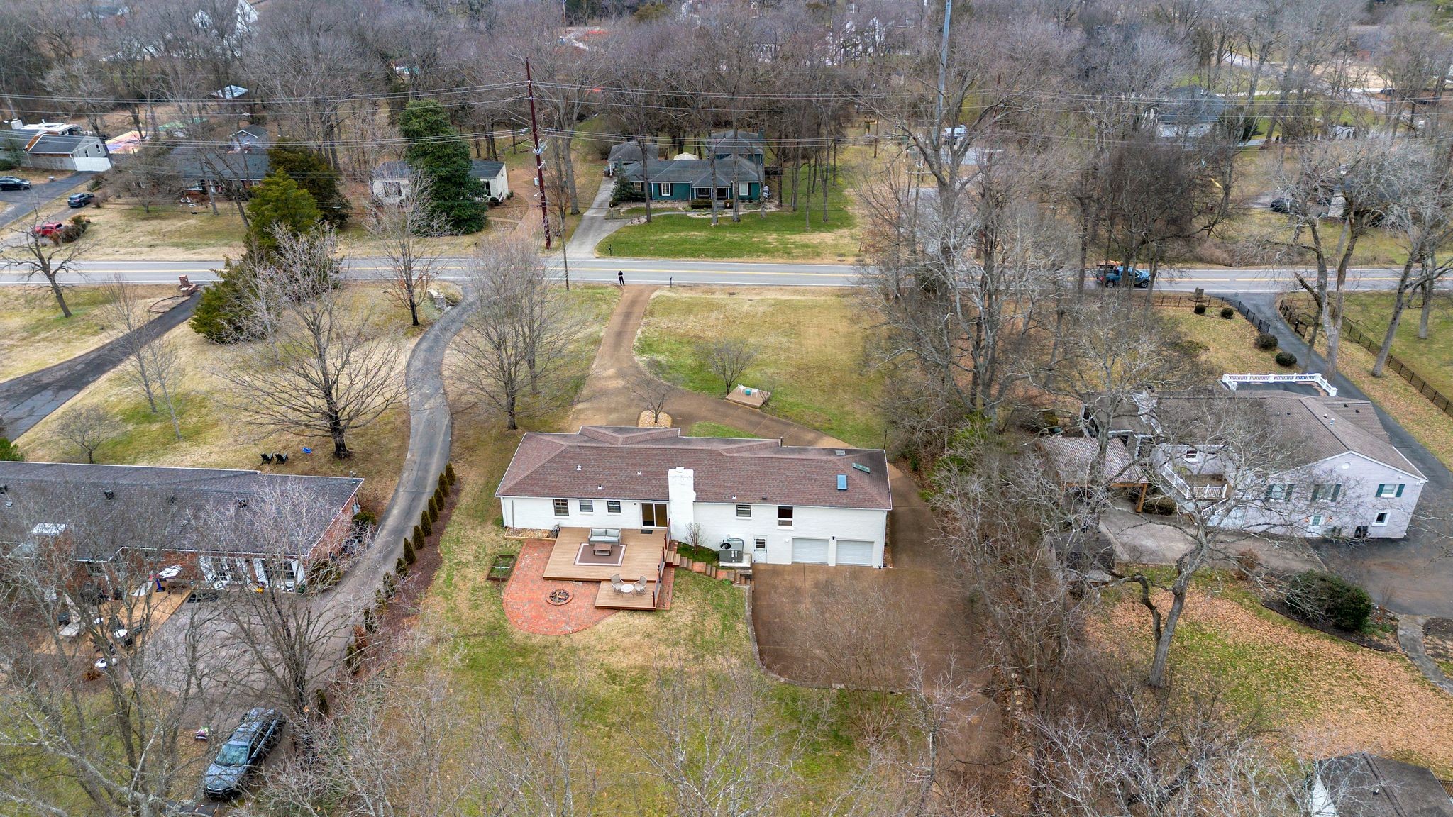 711 Davidson Road Nashville, TN 37205 - Photo 18 of 22 an aerial view of a house with a yard swimming pool and outdoor seating