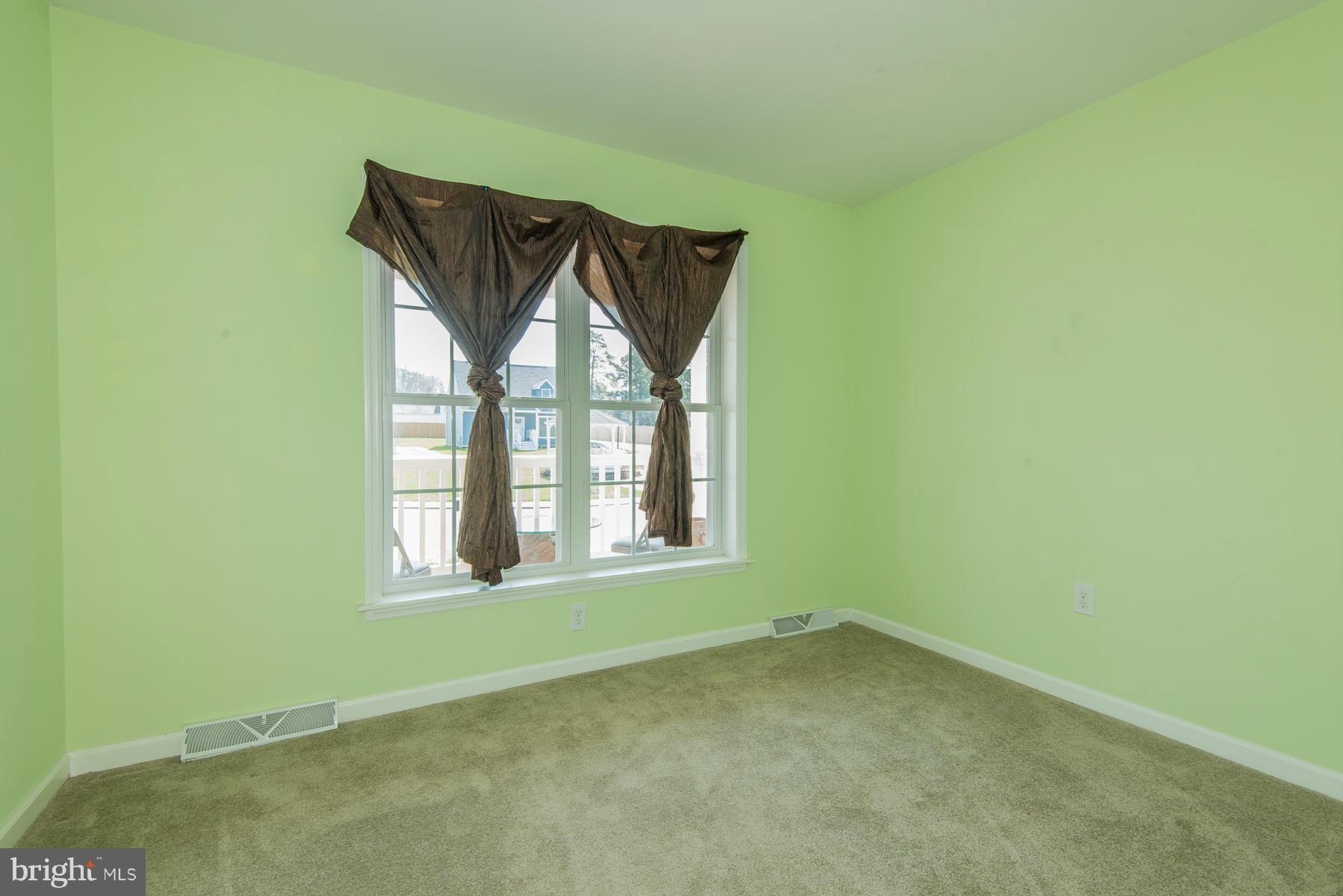 1325 Tree Side Court Odenton, MD 21113 - Photo 14 of 20 an empty room with a window