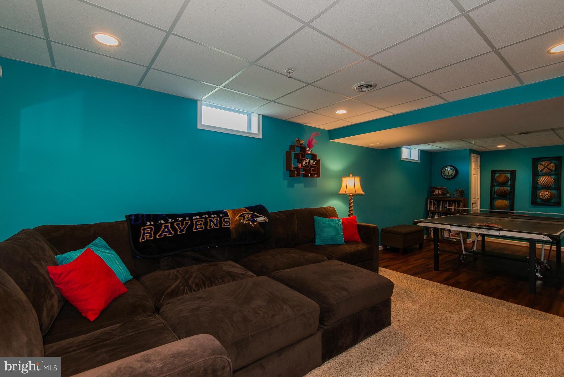 1325 Tree Side Court Odenton, MD 21113 - Photo 17 of 20 a living room with furniture and a wooden floor