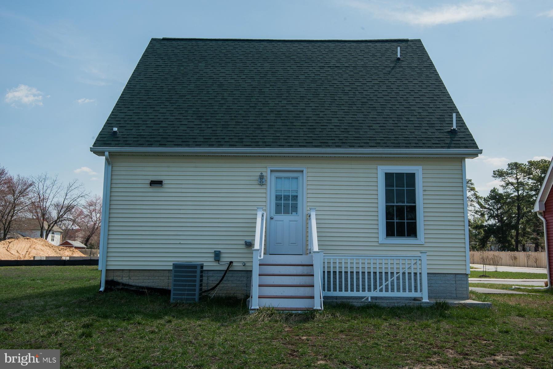 1325 Tree Side Court Odenton, MD 21113 - Photo 19 of 20 a view of a house with a backyard