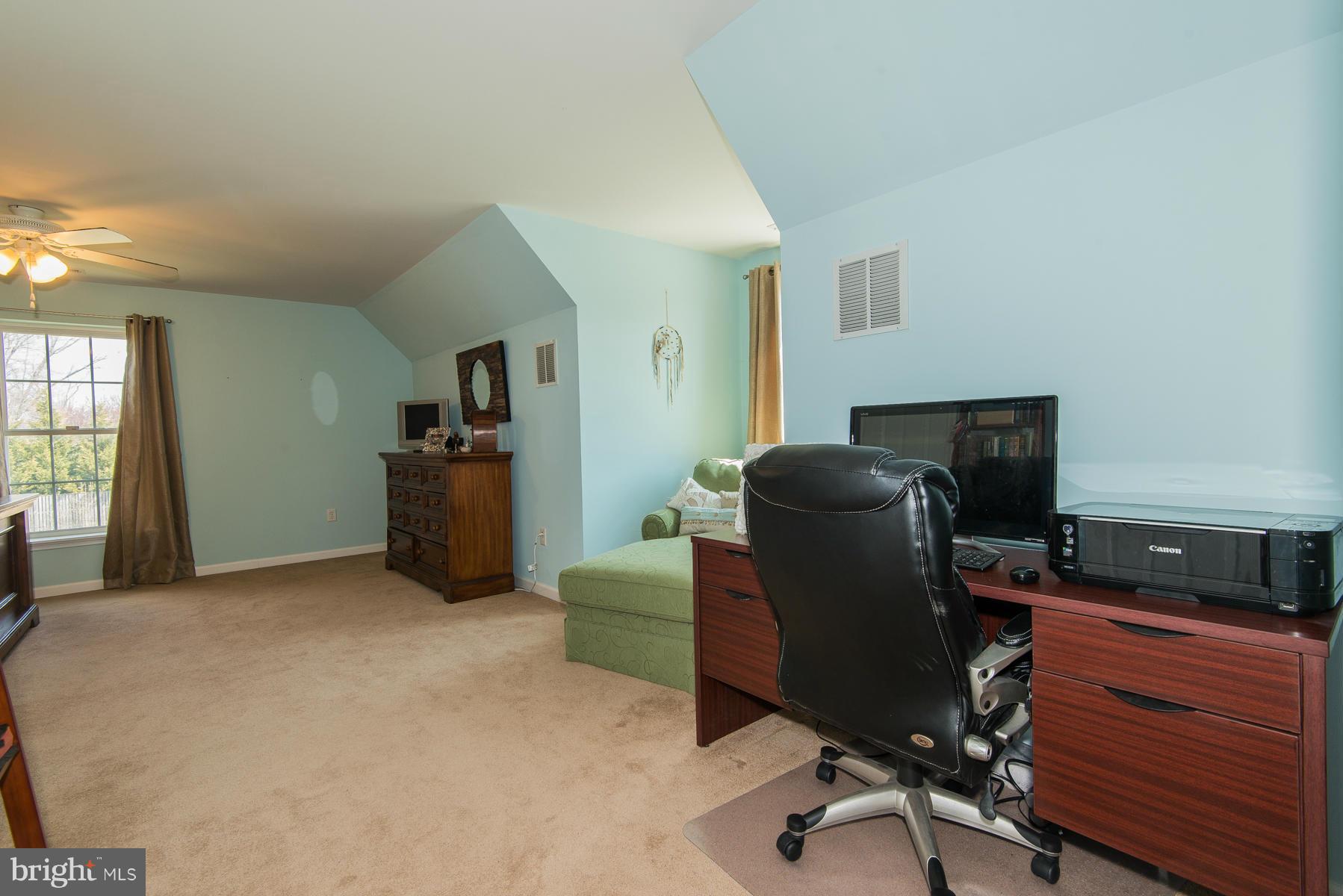 1325 Tree Side Court Odenton, MD 21113 - Photo 10 of 20 a view of a workspace with furniture and a window