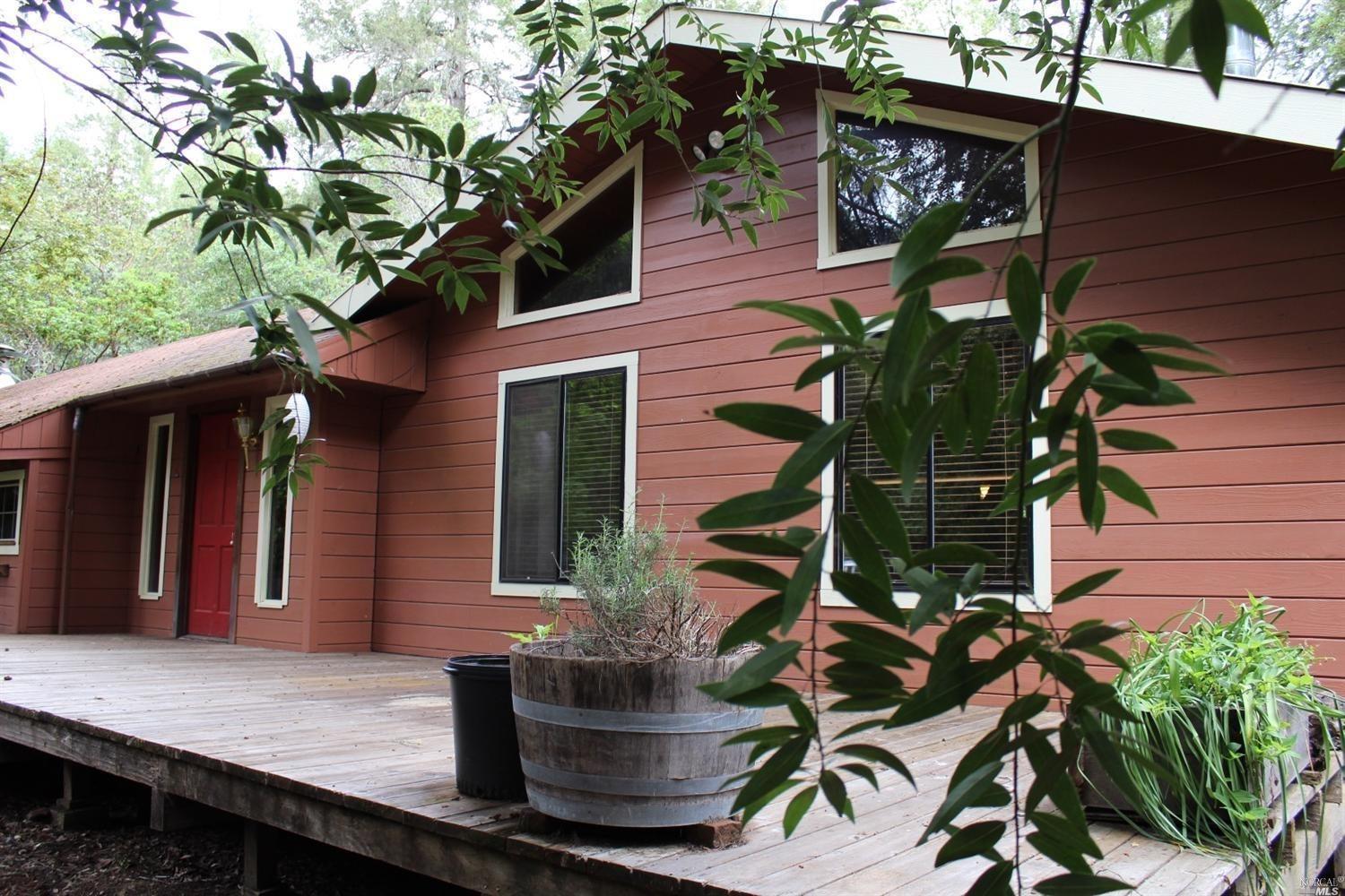 18301 Ray's Road Philo, CA 95466 - Photo 1 of 1 a view of a house with a patio