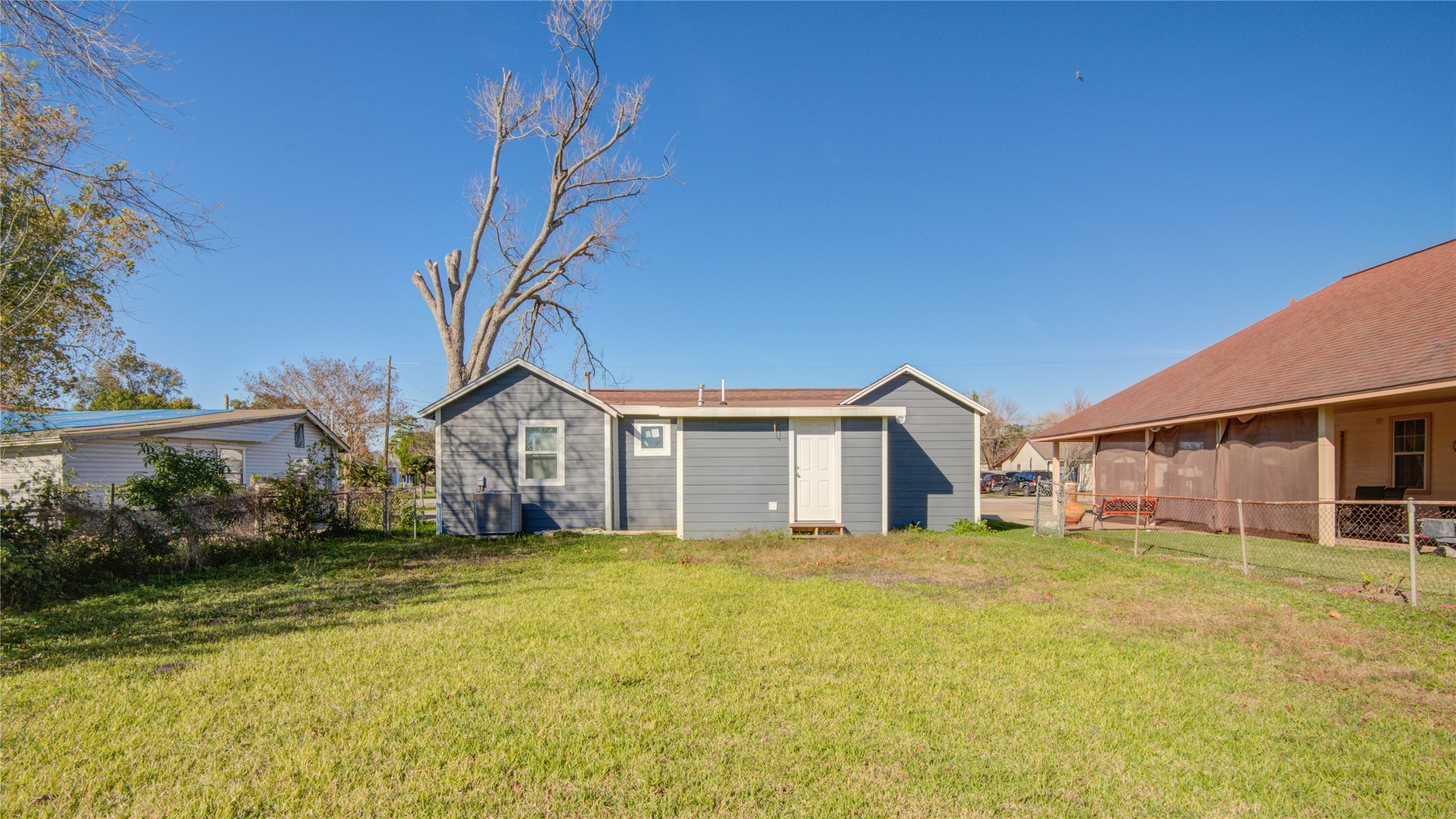 207 East Bernard Street Clute, TX 77531 - Photo 24 of 25 a view of a house with a yard