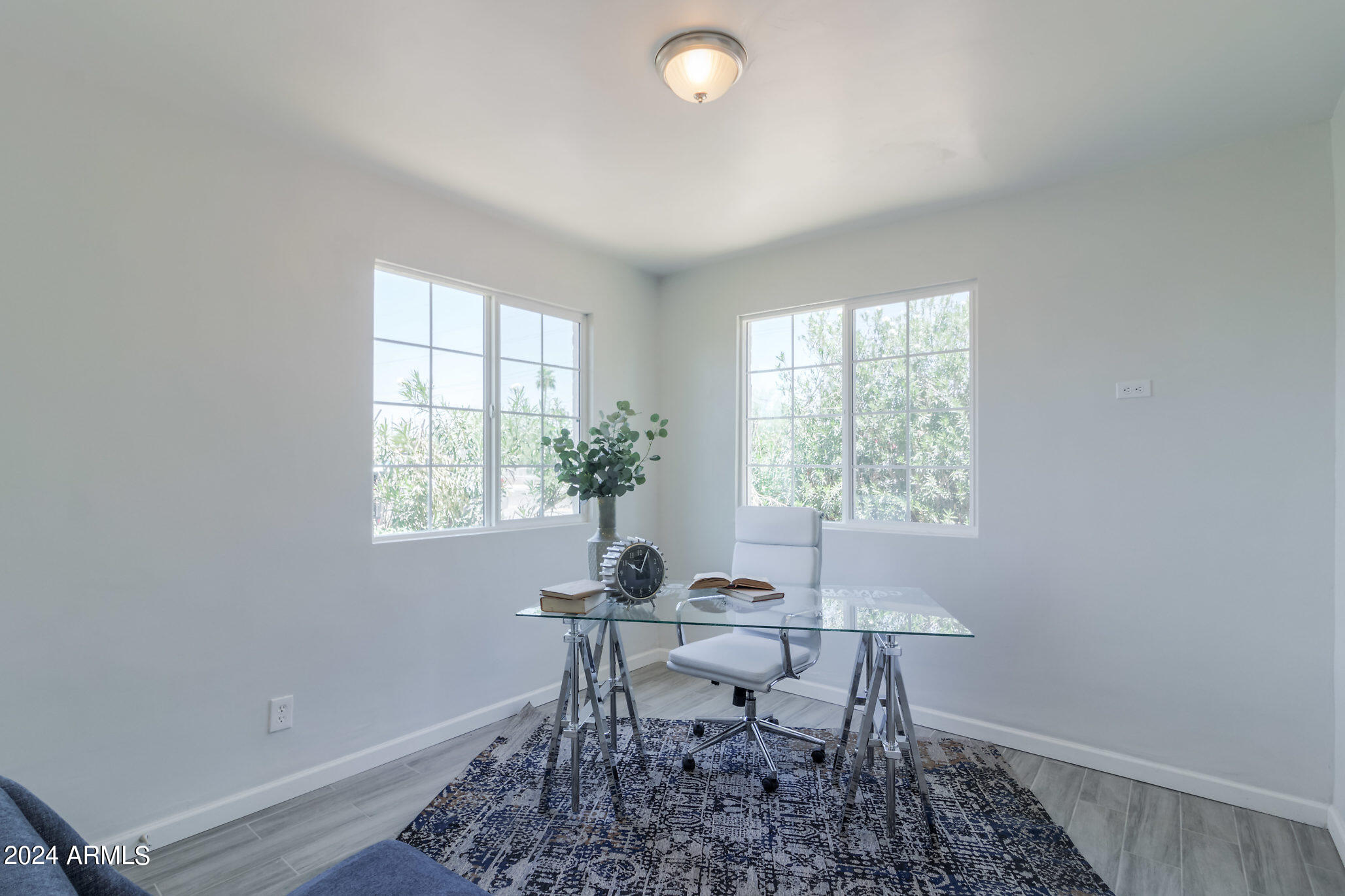 1649 East Oak Street, Unit 1 Phoenix, AZ 85006 - Photo 12 of 14 a workspace with furniture and a window