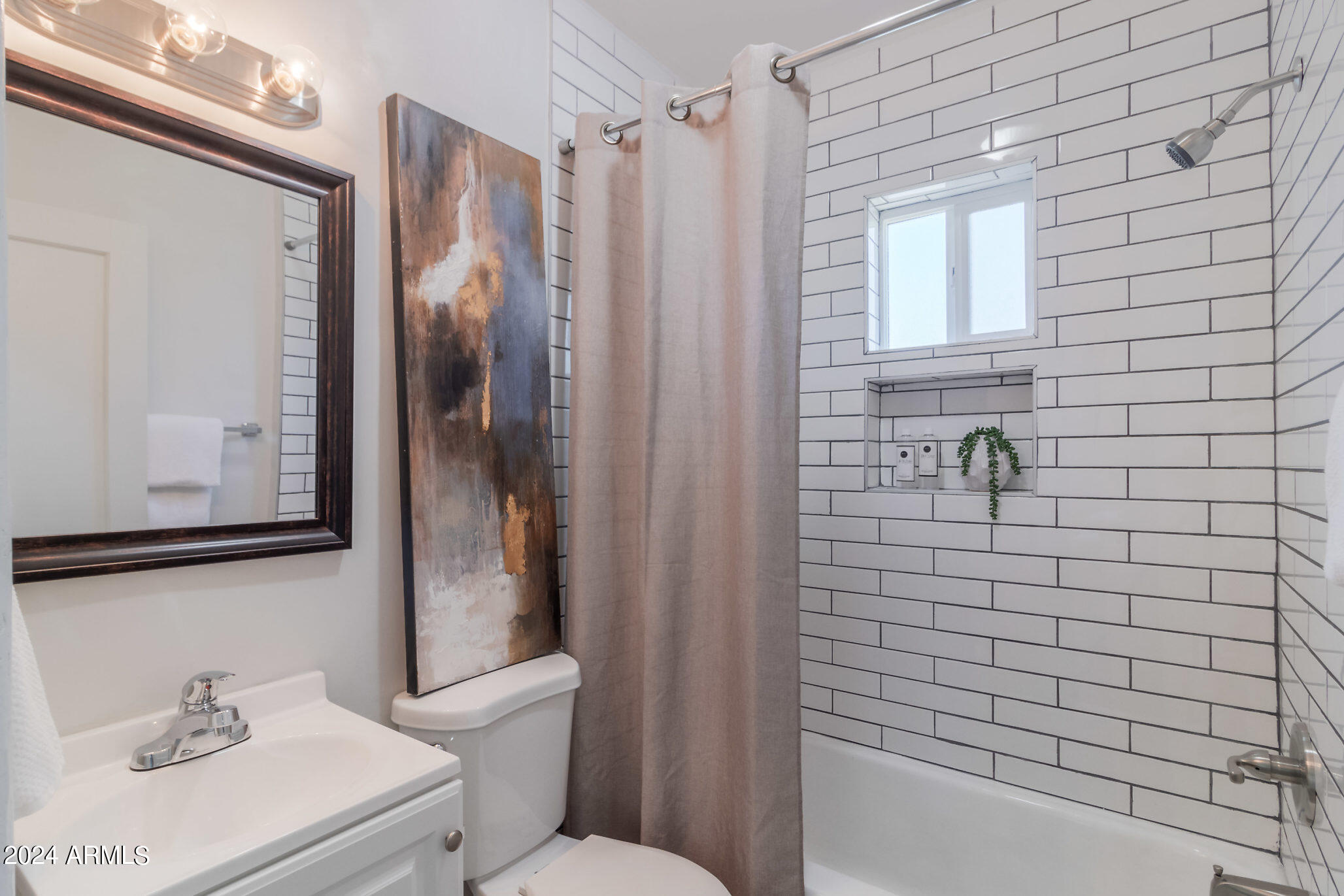 1649 East Oak Street, Unit 1 Phoenix, AZ 85006 - Photo 10 of 14 a bathroom with a sink a toilet and shower
