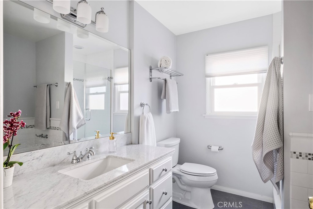 1907 Amber Lane Burbank, CA 91504 - Photo 20 of 25 a bathroom with a sink toilet and shower