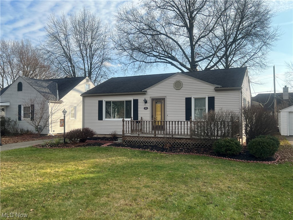 229 Hilliard Road Elyria, OH 44035 - Photo 2 of 28 Ranch-style home with a front lawn and a deck