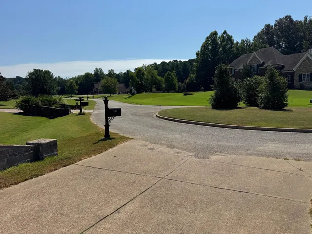 a view of outdoor space with deck and yard