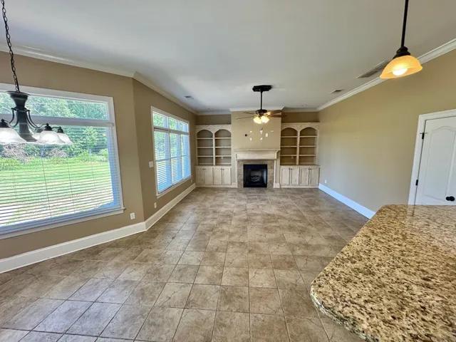 a view of livingroom with kitchen