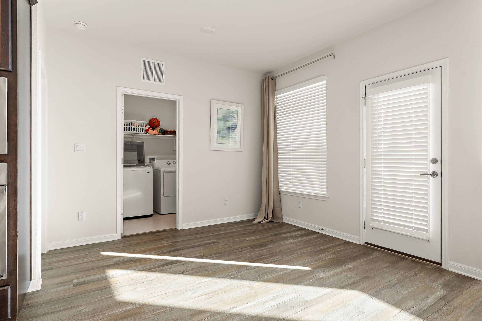 604 Spindrift Lane Leander, TX 78641 - Photo 25 of 32 a view of a room with wooden floor and closet