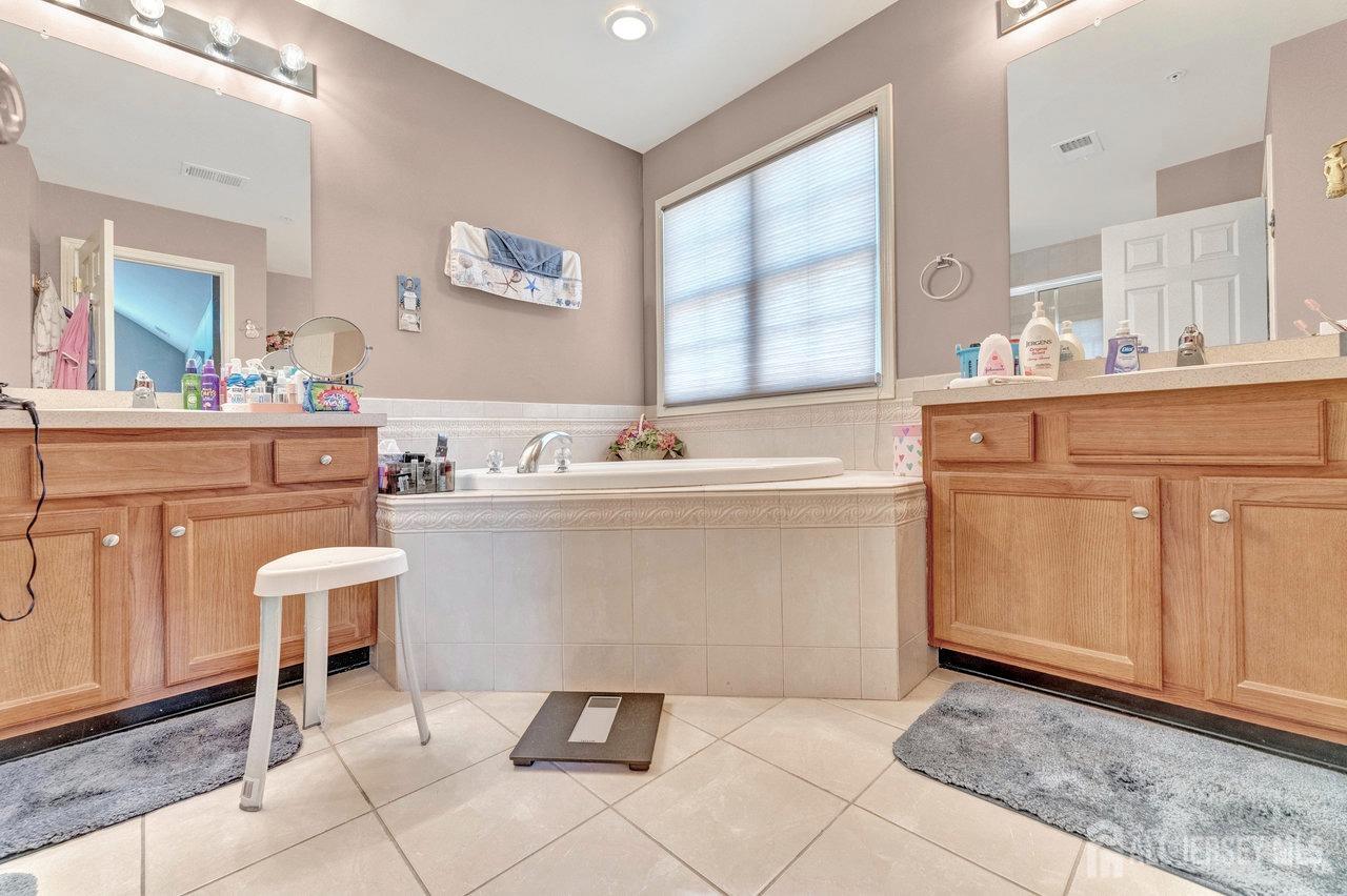 6 Raritan Reach Road South Amboy, NJ 08879 - Photo 23 of 31 a room with a sink cabinets and window