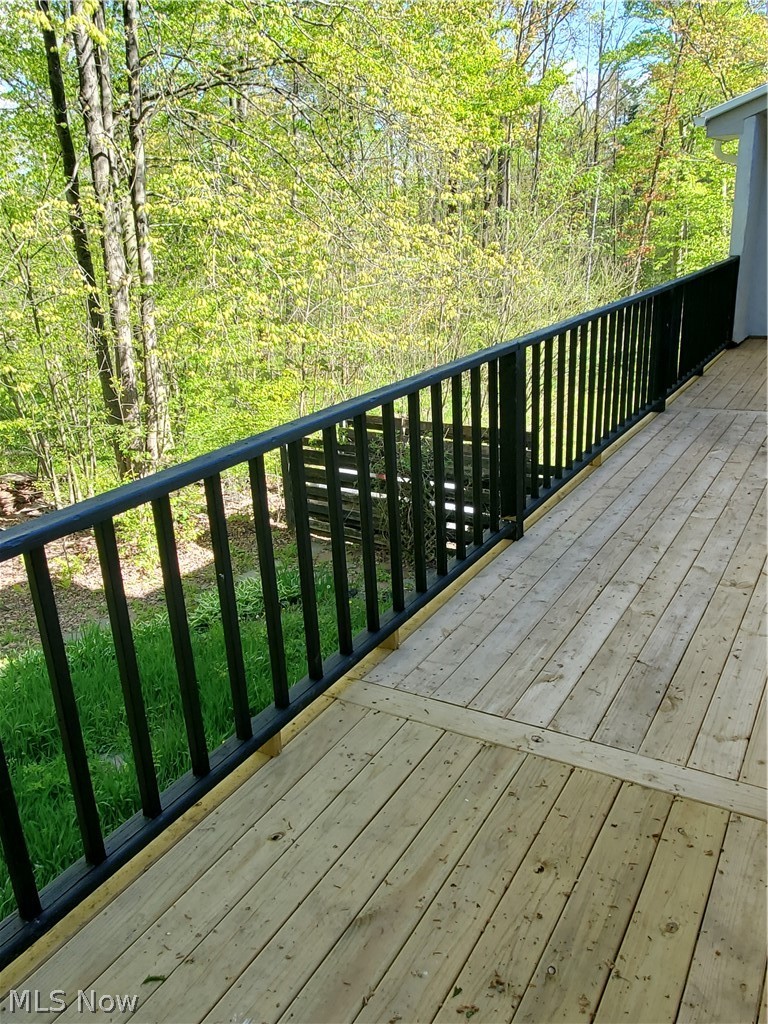 8271 Buffham Road Lodi, OH 44254 - Photo 18 of 35 New decking on 22nd floor covered Deck off of Bedroom 2