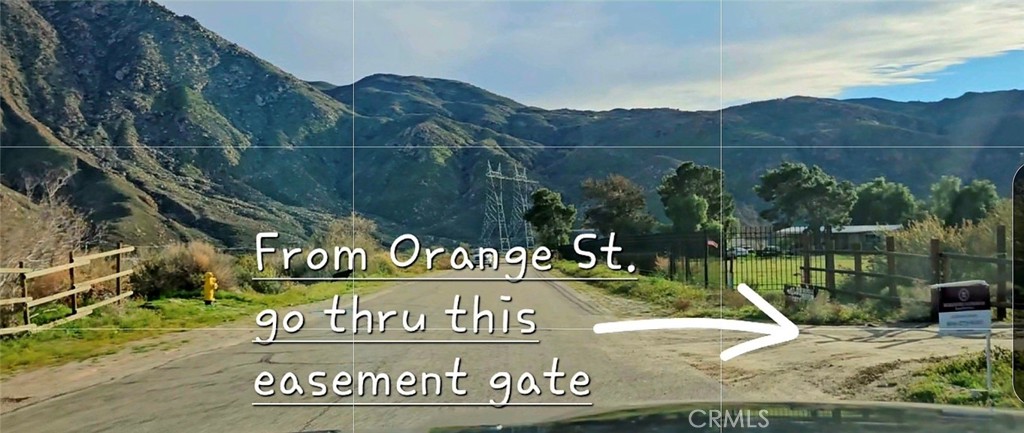 129 Dolores Cabazon, CA 92230 - Photo 3 of 12 a view of a park with a wooden fence