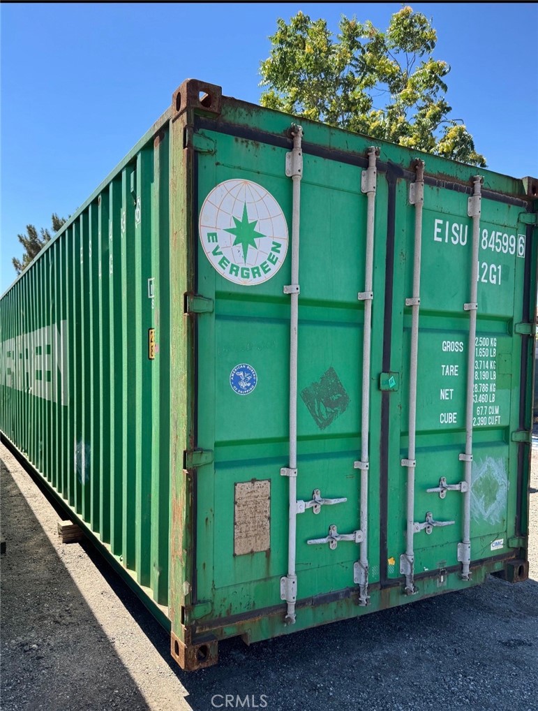 129 Dolores Cabazon, CA 92230 - Photo 6 of 12 a green sign that is on the side of the road