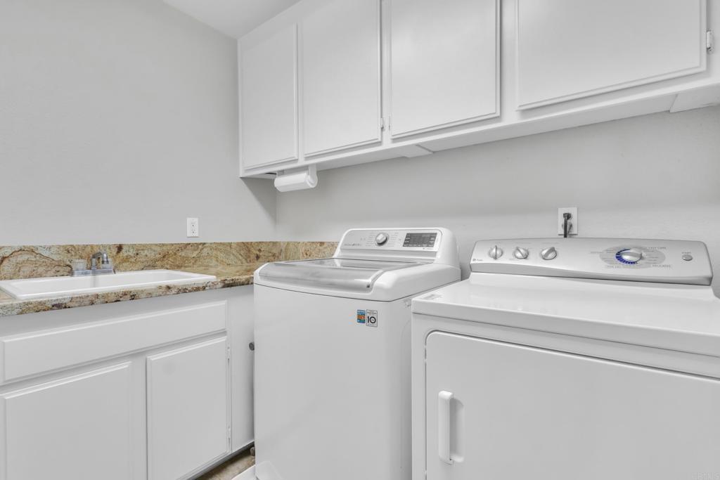 10403 Valley Waters Drive Spring Valley, CA 91978 - Photo 25 of 40 a utility room with dryer and washer