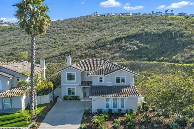 a view of a house with a balcony