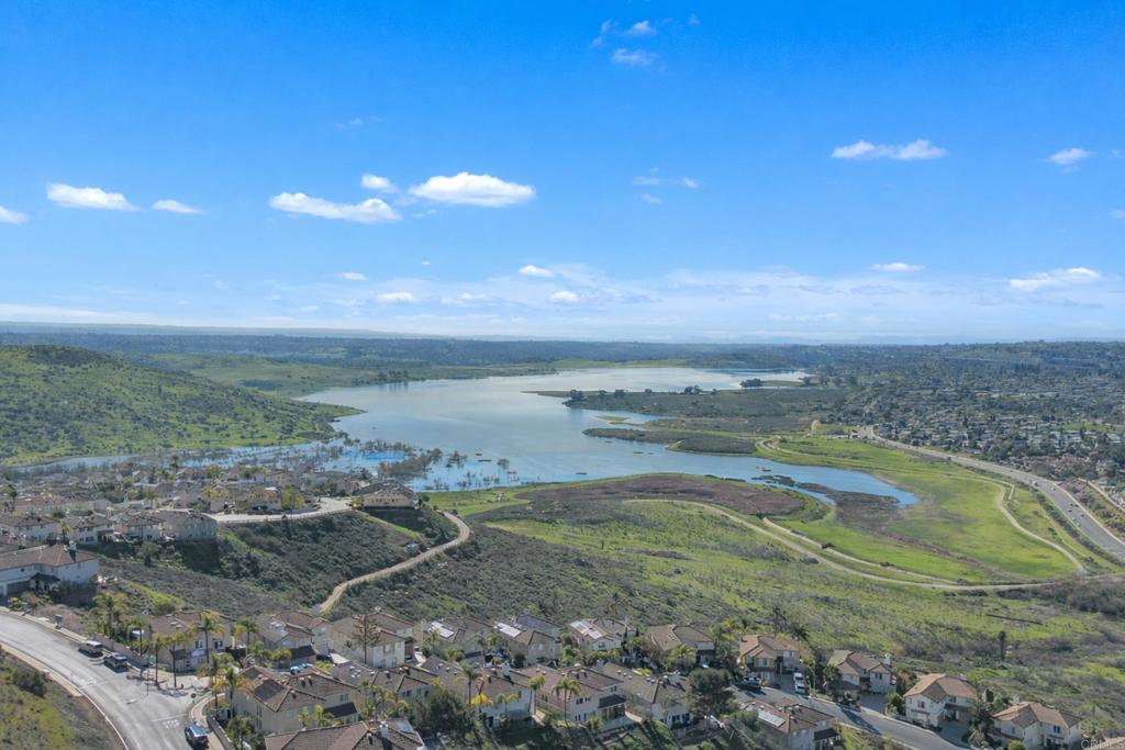 10403 Valley Waters Drive Spring Valley, CA 91978 - Photo 7 of 40 a view of a lake with a mountain