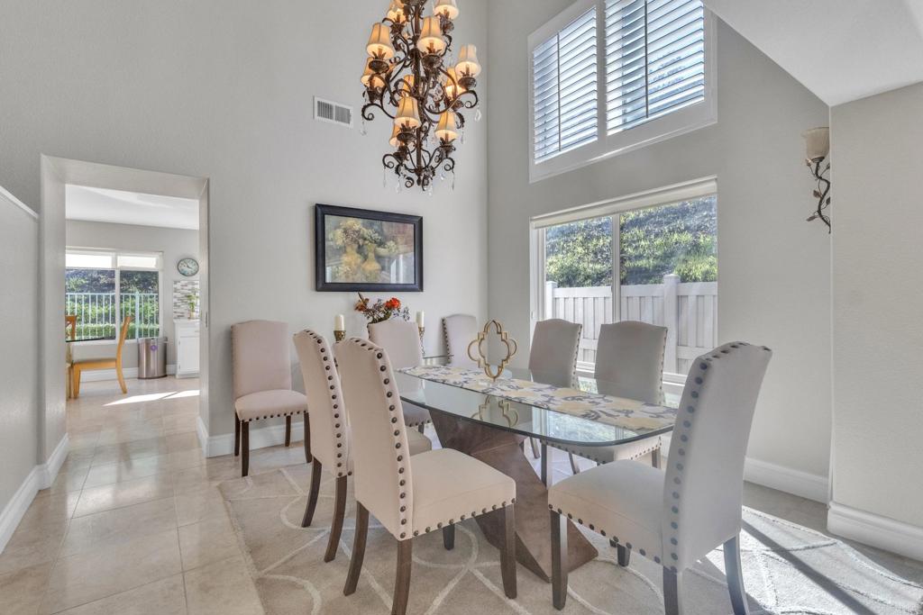 10403 Valley Waters Drive Spring Valley, CA 91978 - Photo 9 of 40 a view of a dining room with furniture window and outside view