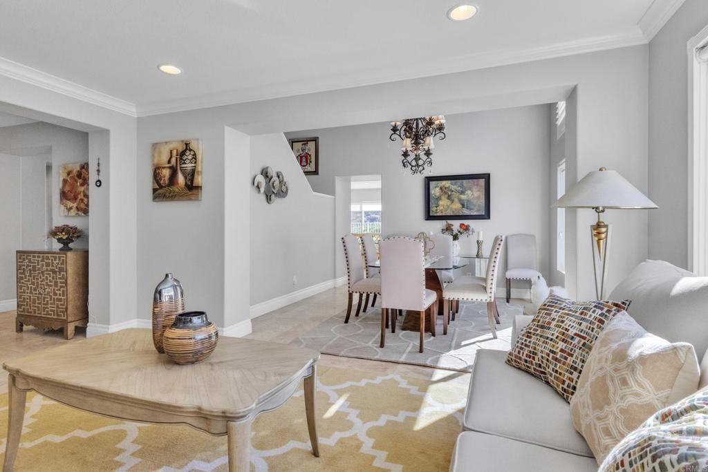10403 Valley Waters Drive Spring Valley, CA 91978 - Photo 10 of 40 a living room with furniture and wooden floor