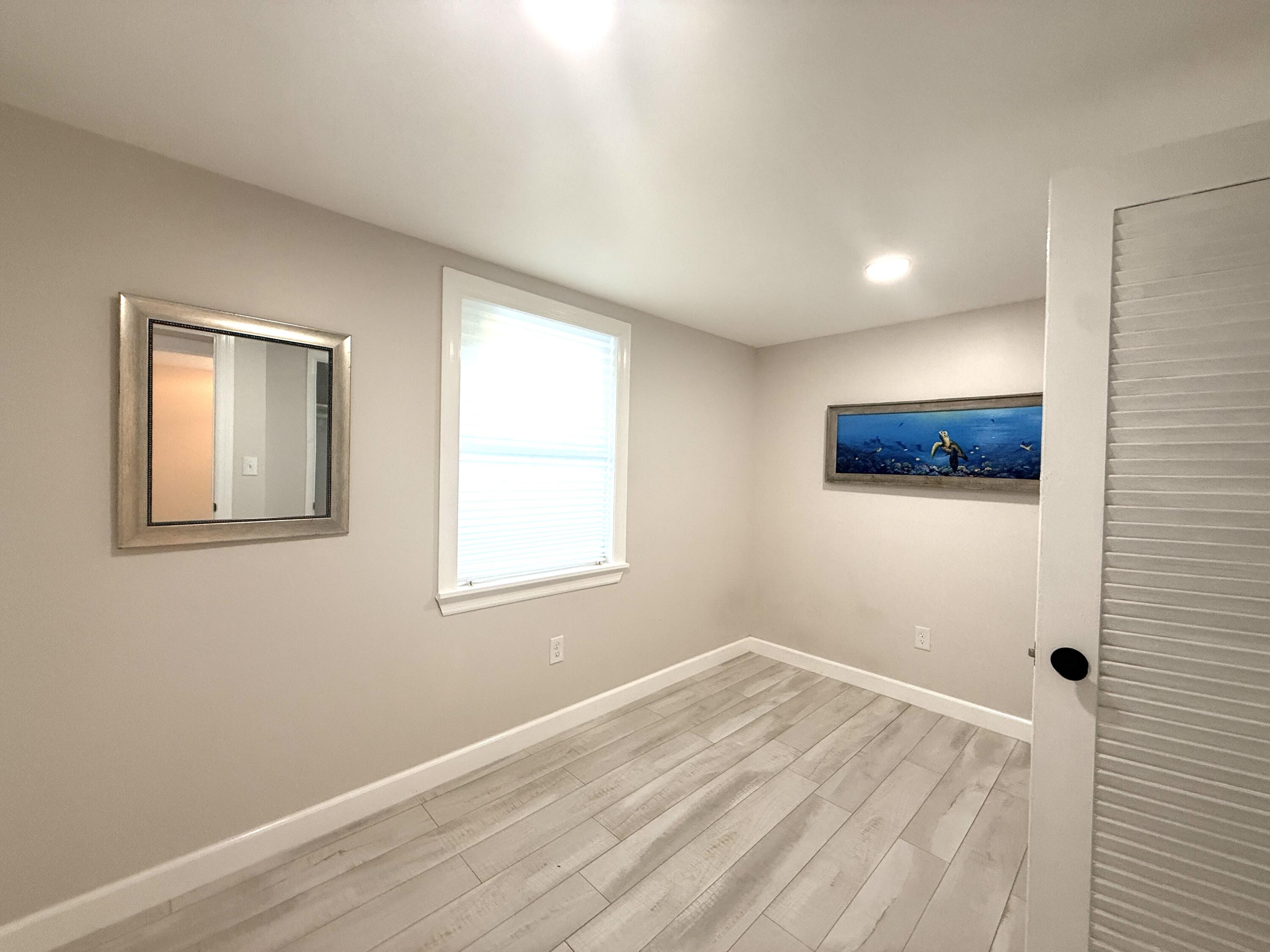 1093 Highview Road Lantana, FL 33462 - Photo 15 of 34 a view of a room that has a window in it